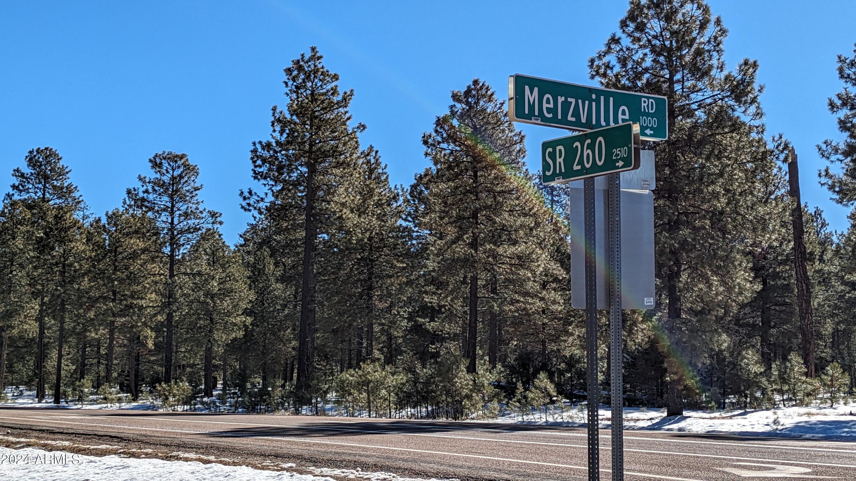 This attractive, level 1-acre corner lot is near one of the main entrances to the Forest Lakes subdivision. . Zoning is CG10000, making this an ideal property for a commercial enterprise adjacent to Highway 260. Alternatively, a buyer may seek a zoning change for residential or multifamily uses. The trees have been thinned in accordance with Firewise standards, resulting in a beautifully wooded property that is ready for new construction. Seller is also offering the adjacent lot at 1960 Merryland Road, and buyers should consider purchasing both lots together. Forest Lakes is a premier residential/vacation community in the cool, tall pines at 7500 feet and only 2 hours from the valley.