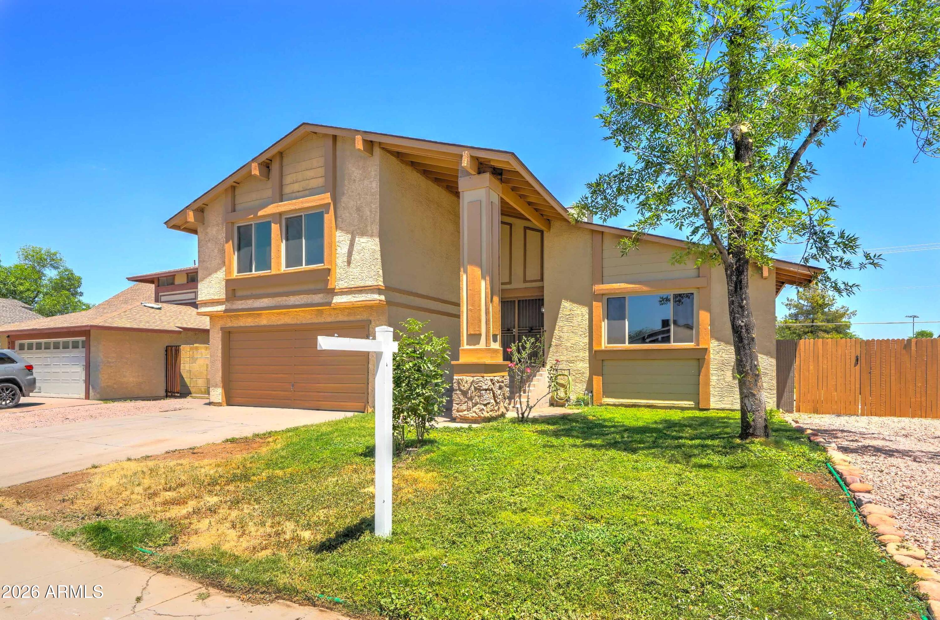 A truly rare find! No HOA and right in the middle of town - easy access to parks, highways, amenities, shopping, and everything in between. Home features gorgeous over $50k in renovations and remodels EVERYWHERE (see supplemental for everything)! Solar panels reduce electrical bills by 30-40%. High-speed fiber optic cable recently installed as well. This diamond in the rough will not last long! $50k in renovations and remodels were completed in the last two months:
- Luxury vinyl plank flooring in first level and all bathrooms
- Laminate flooring everywhere else
- 4-inch white baseboards
- Navajo White and Sky Blue paint all throughout...perfect complement to floors and carpet
- Gravel driveway to RV gate
- Automatic garage door opener for counterweight garage door
- Bathroom fixtures such as vanities, faucets, rack fixtures, and cabinets
- Soft-close cabinets in kitchen
- Matte bronze paint on stair railings
- Kitchen extension
- Cabinets on first level
- Granite kitchen sink
- Kitchen chandelier
- Hallway chandelier
- Barn door in master bathroom
- Sound-reducing, energy-efficient windows in all bedrooms, dining room, and living room
- Automatic sprinkler systems in front and back yard
- Repairs to walls, outlets, and doors throughout

Plus these incredible preexisting features:
- RV gate
- Regal entryway with double-front door
- Solar panels (buyer must qualify for payment)
- Tasteful tri-level floorplan
- Chocolate carpet
- Upgraded washer and dryer