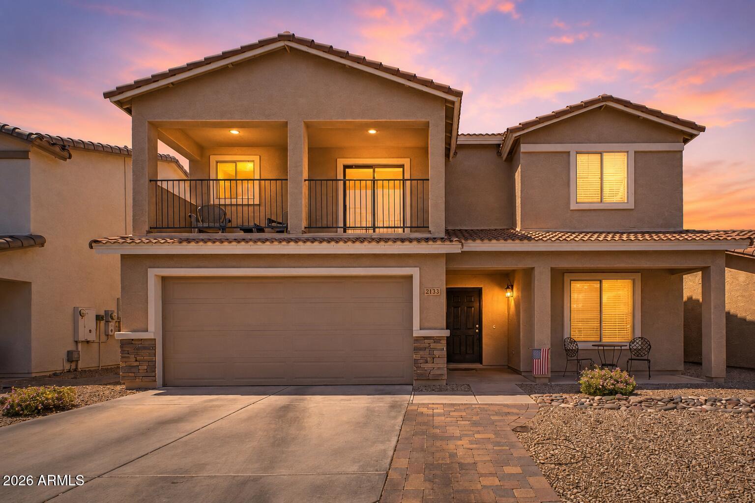 Mountain views, an oversized balcony, and a spacious game room make this beautifully maintained 4-bedroom, 2.5-bath home a must-see! Offering 2,184 square feet of thoughtfully designed living space, the flexible floor plan features one bedroom downstairs, perfect for guests or a home office, with three additional bedrooms upstairs, including the spacious primary suite.

The open-concept kitchen overlooks the great room and offers abundant cabinet space, a breakfast bar, and plenty of natural light. The primary suite features a private sliding glass door leading to the oversized covered balcony, where you can enjoy stunning mountain views and Arizona sunsets.

Step outside to an easy-maintenance backyard with new artificial turf and an oversized pergola, perfect for entertaining or relaxing. Residents enjoy access to a heated community pool, clubhouse, dog park, basketball court, and walking paths. Conveniently located near shopping, dining, schools, hiking trails, and freeway access, this home offers the perfect combination of comfort, space, and lifestyle.