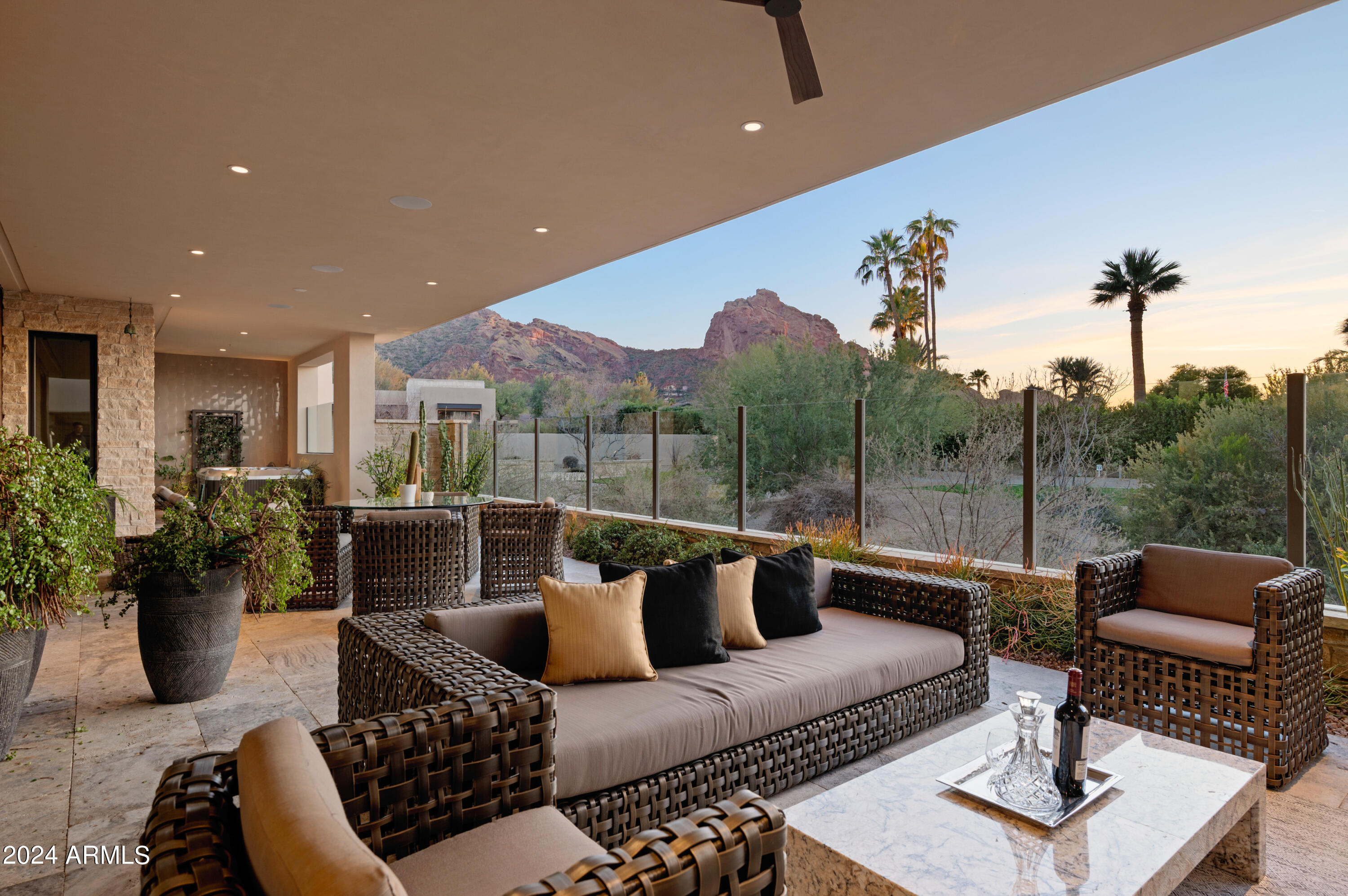 Experience luxurious Resort style living at Mountain Shadows Villas in this beautiful single level home situated on the 18th tee box of the golf course with exceptional views of Camelback Mountain and sunsets! Low maintenance lock & leave living with high end finishes throughout, this home offers everything you are looking for. A great room floor plan featuring 10ft ceilings and accordion doors opening to the expansive covered patio with gas fireplace & above ground spa, this is true Arizona paradise with indoor/outdoor living perfect for entertaining or relaxing in your private oasis. A private gate from your patio leads you on to the golf course and a short walk to enjoy the finest amenities at Mountain Shadows Resort, including a state-of-the-art pool and spa, exercise facility or any of their many dining options. Premium location in Paradise Valley near fine dining, shopping, the airport and the best entertainment offerings in The Valley.

Paradise Valley, Arizona, is a charming town renowned for its exclusive estates, luxury resorts, and stunning desert vistas, framed by Camelback Mountain and Mummy Mountain. Just minutes from Phoenix, the town offers a refined lifestyle with opulent homes, upscale retreats, golf courses, and spa resorts. Strict zoning regulations underscore Paradise Valley's commitment to preserving its natural beauty, creating a harmonious blend of sophistication and the Sonoran Desert environment. This idyllic oasis stands as a testament to the town's unique fusion of luxury living and breathtaking landscapes.