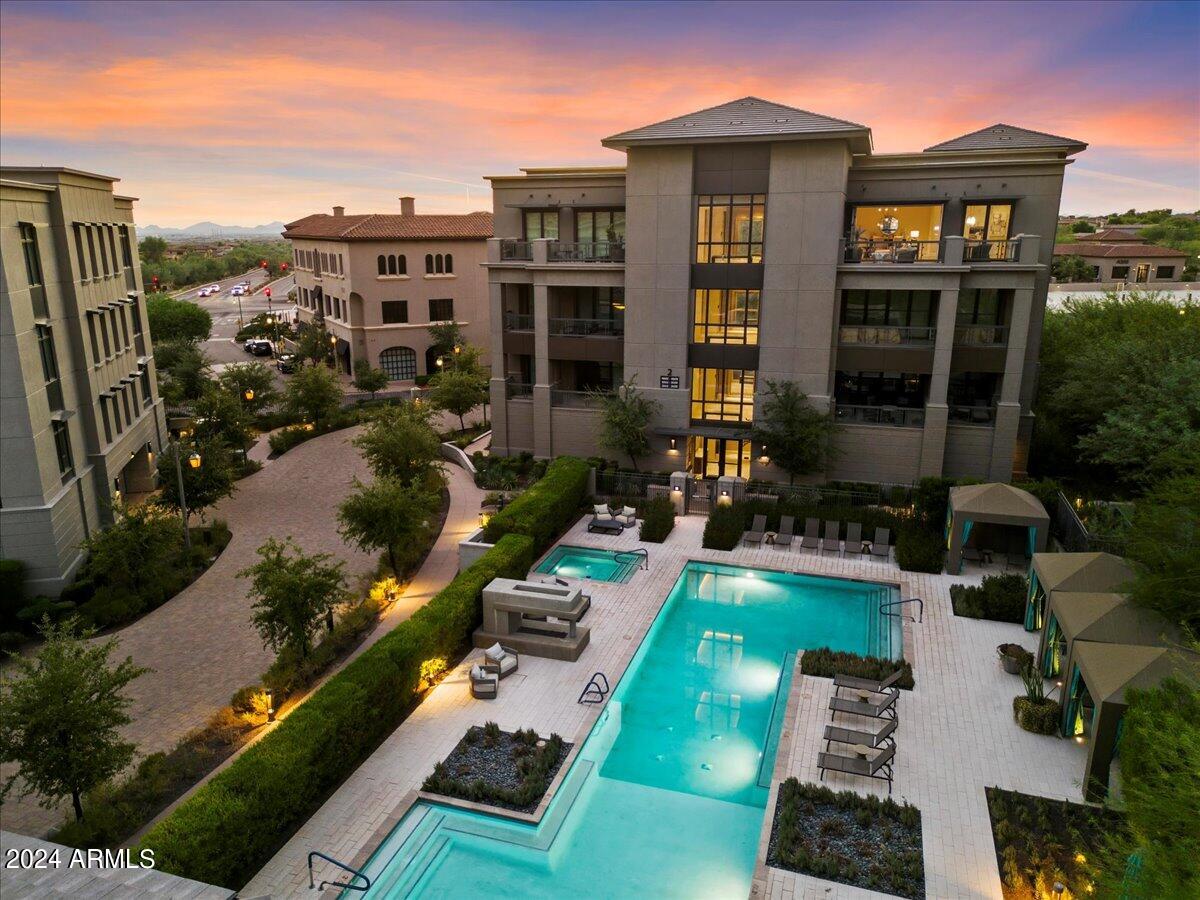 Membership available separately. Additional fees apply.
Here's your chance to own a penthouse with a pool view in the exclusive 24-hour guard-gated community of Silverleaf at DC Ranch. This stunning residence features professional interior design, including elegant white cabinetry and Provenza white oak wood floors throughout. The entertainer's kitchen boasts Taj Mahal Quartzite countertops, an oversized island with storage on both sides, and top-of-the-line Sub-Zero Wolf appliances, including a dual-zone wine fridge. The home also includes built-in cabinetry in the home office. An upgraded Crestron smart home system offers automated shades, a security system, and more.... Enjoy a large private deck, semi-private elevators, and a spacious layout of 3,170 square feet with 3 bedrooms, an office, and 3.5 baths. The community provides resort-style amenities such as walking paths, trails, parks, and community centers.