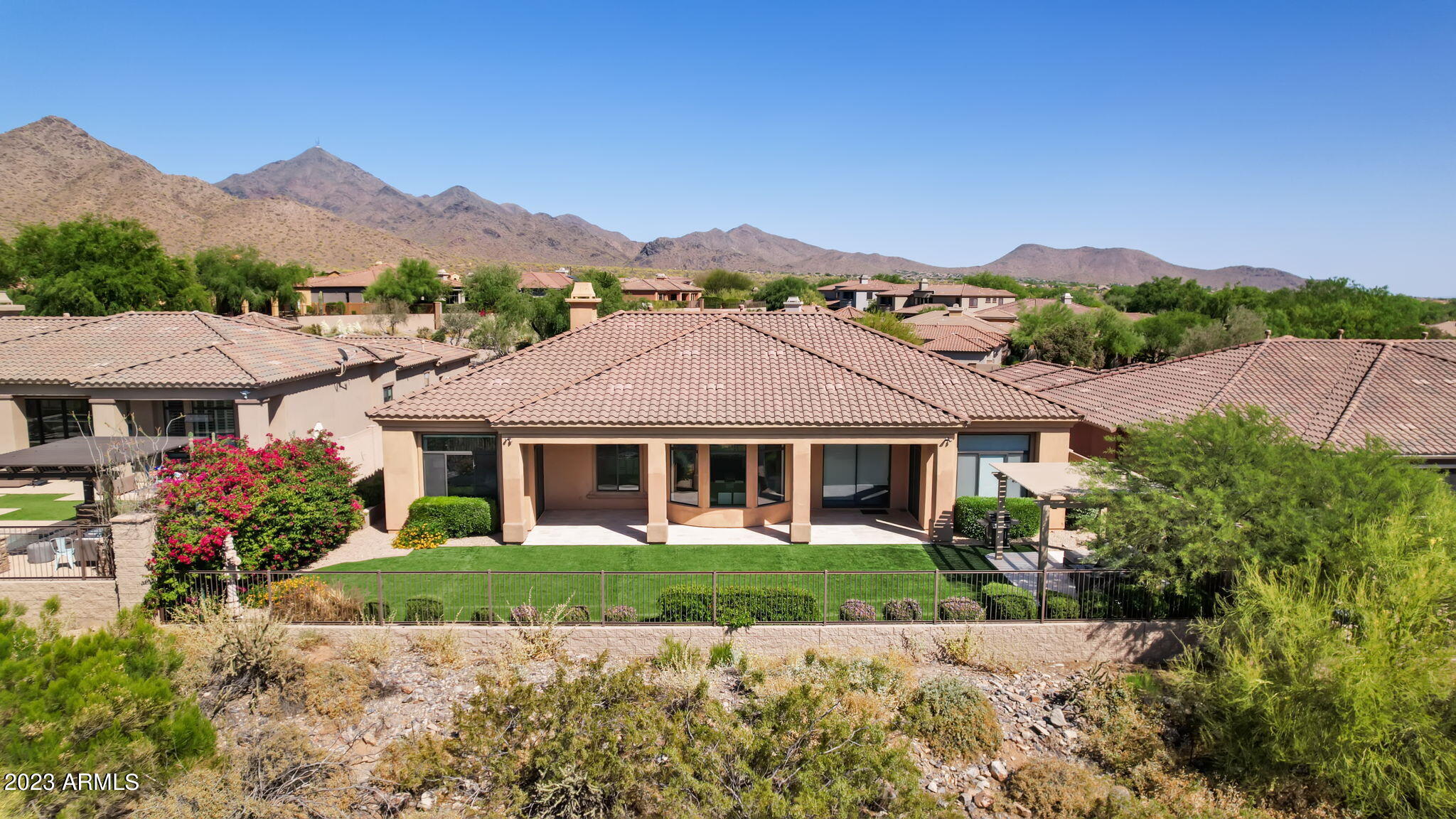 Stunning Views + Refined Living in Windgate Ranch! Set within the prestigious gated community of Windgate Ranch, this beautifully remodeled home combines modern style with functional living spaces and breathtaking surroundings. Thoughtfully updated throughout, the interior features smooth walls, updated baseboards and door casings, redesigned archways for a more contemporary feel, and refreshed cabinetry accented with updated hardware and designer lighting. The kitchen and entertaining bar showcase updated countertops and an inviting layout ideal for gatherings.
The main residence offers three ensuite bedrooms plus a private office, along with a generous flex space adjacent to the secondary bedrooms-perfect for a media room, playroom, teen lounge, or additional living area. The spacious primary suite includes a luxurious bath with dual vanities and two walk-in closets. A detached guest casita with its own private entrance provides excellent flexibility for guests, extended stays, or live-in assistance.

Residents of Windgate Ranch enjoy resort-style amenities including a community center, multiple pools, playgrounds, and convenient access to DC Ranch Village, golf, dining, shopping, and scenic hiking and biking trails. A rare opportunity to lease a beautifully updated home in one of North Scottsdale's most desirable communities.