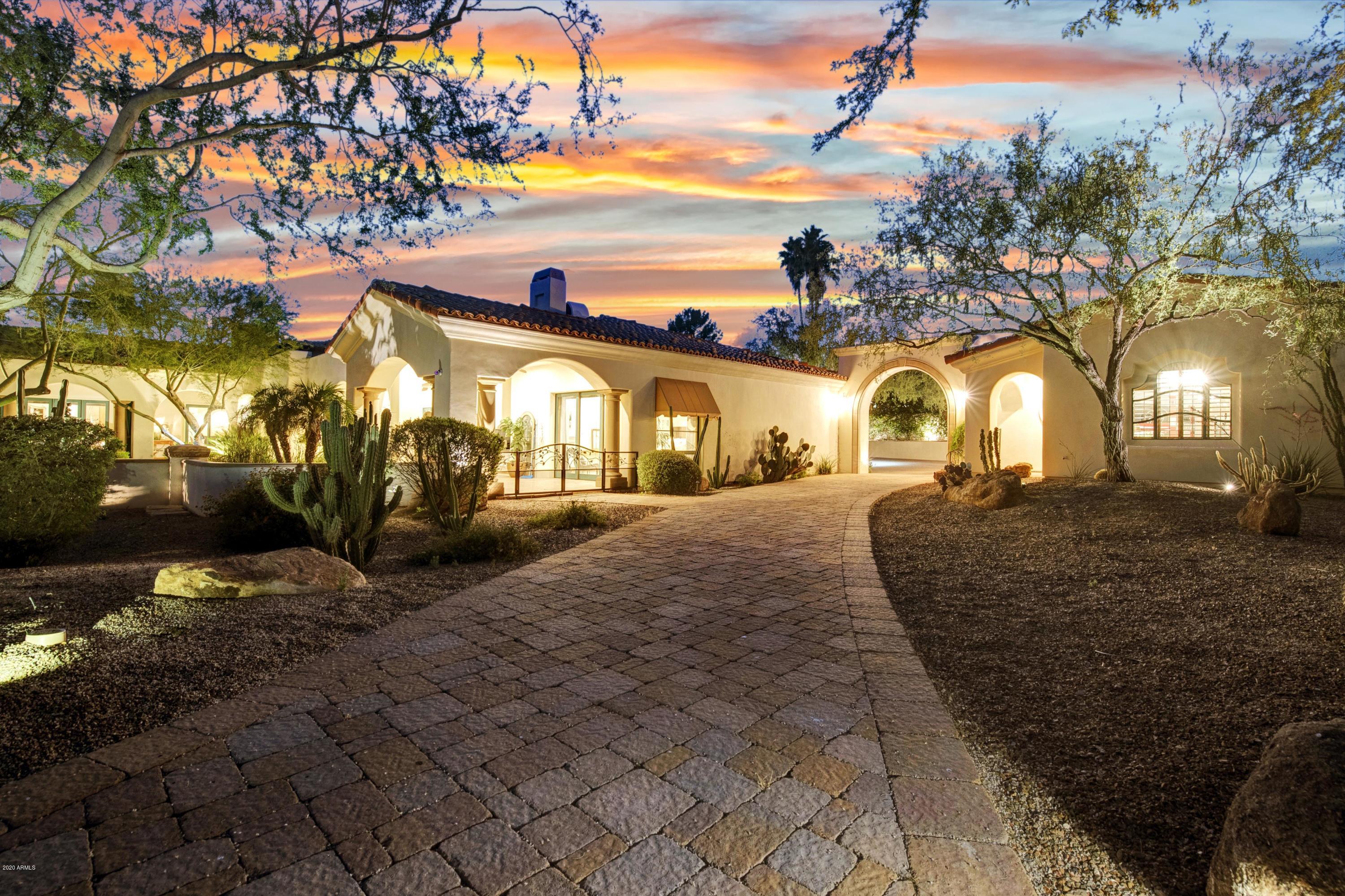 BACK ON MARKET this CLEAN AIR home has DUAL INDEPENDENT AIR EXCHANGE SYSTEMS capable of air exchange every two hours, creating an environment similar to a hospital operating room within. This beautiful estate is on an expansive one acre lot in a highly private gated community. SEVEN cars worth of garage spaces including auto lifts and GLASS OFFICE WALL to view your dream acquisitions! Custom doors and windows! Custom Designed Walnut parquet floors and brushed gold leaf ceiling detail in foyer and formal living room. Outdoor patio areas with fountains and gardens. This incredibly ENERGY EFFICIENT home features six A/C units as well as 14 inches of foam insulation throughout. This sanctuary is a true work of art, with artisan design touches in every room and on every patio.