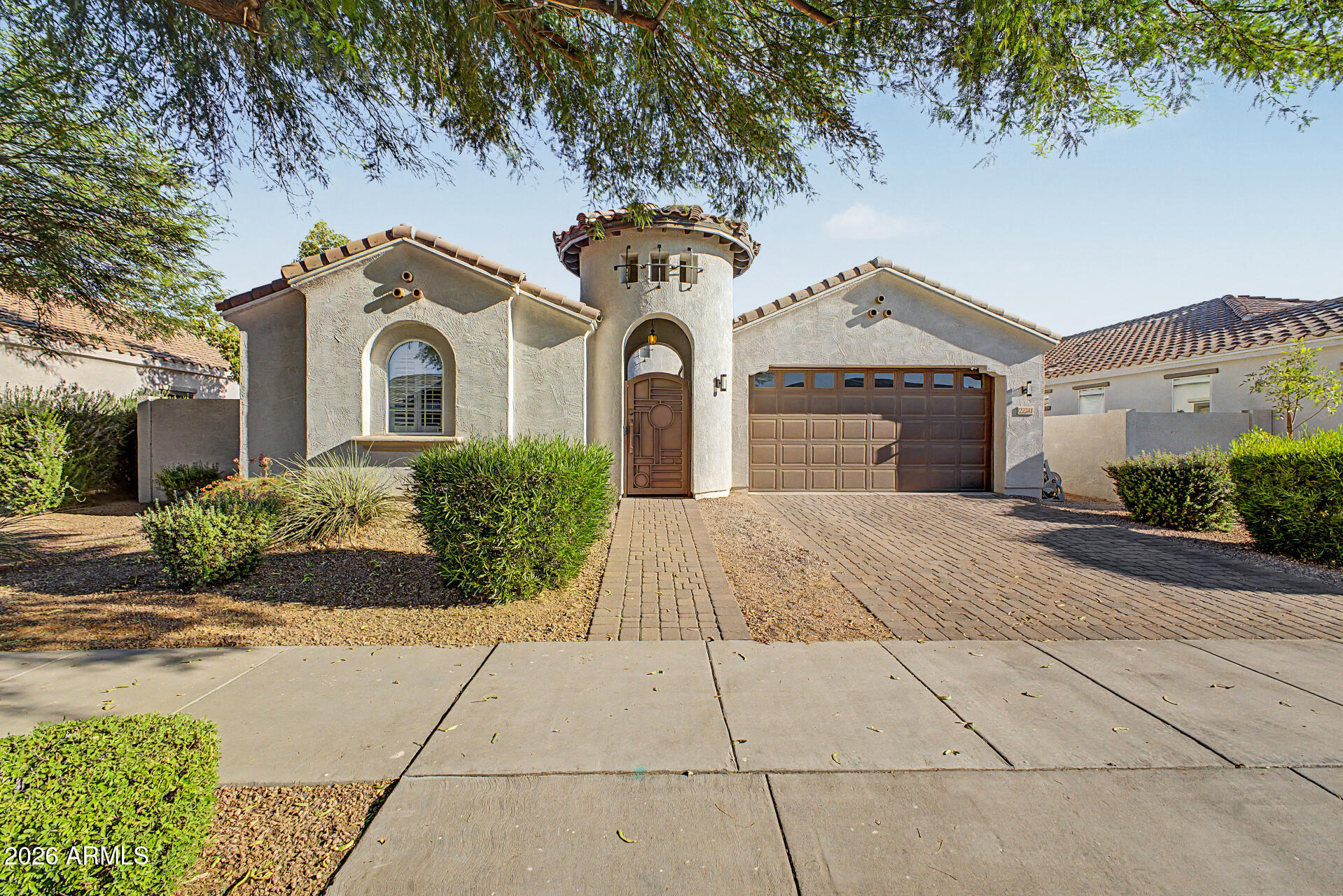 Welcome to this beautifully designed Queen Creek home offering a rare detached private casita. Enter through a custom iron gate to the beautiful courtyard that connects the main living area to the detached casita. The main home offers open concept living & a split floorplan. It has 3 bedrooms, 2 baths, oversized tile throughout the main living areas, & carpet in the bedrooms. The kitchen is spacious & features an island, breakfast bar, & a walk-in pantry. A large laundry room with shelving, an alarm system, soft water system, & a network rack/system for home camera equipment. The spacious primary suite includes a large walk-in shower, walk-in closet, double sinks, and a separate toilet room. The backyard offers a beautiful grass area & covered patio, perfect for entertaining. There is a 2-car garage w/ epoxy floors, built in cabinets, & utility door. All appliances are included! The casita includes its own private bathroom with a walk-in shower, walk-in closet, and sliding door access to the courtyard, making it ideal for guests, extended family, a private office, or studio. Homes with a private casita are very hard to come by in this area & for this price. Located in a desirable Queen Creek community near shopping, parks, schools, entertainment, and more. This home offers a rare combination of space, function, and location. You wont want to miss it!