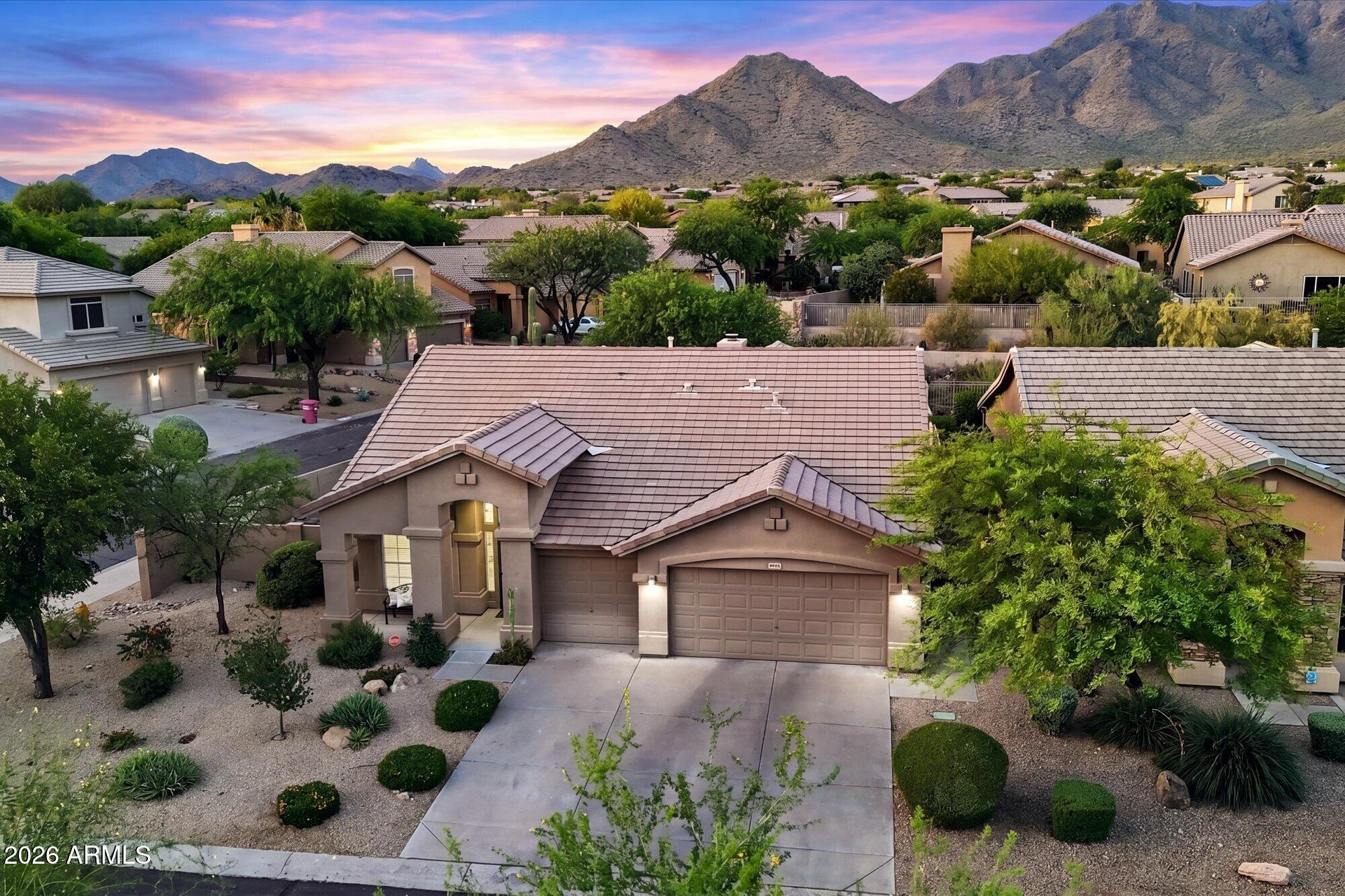 Step inside this beautifully updated single level home in McDowell Mountain Ranch featuring 3 bedrooms plus an office, 2 bathrooms, and a 3 car garage. Situated on a corner lot next to a wash, the home offers added privacy and open space. Recent upgrades include hardwood flooring, fresh interior paint, custom plantation shutters, new ceiling fans, outdoor screens including the patio door, and a redesigned kitchen island that anchors the open living space overlooking the lush backyard. Front & backyard landscaping was refreshed in 2025 creating inviting outdoor spaces for relaxing or entertaining. Located in a highly desirable community with access to 2 community pools, tennis & basketball courts, an aquatic center, playgrounds, walking & hiking paths, golf, parks, restaurants & shopping! Located in the highly desirable McDowell Mountain Ranch community with access to 2 community pools, tennis courts, basketball courts, an aquatic center, library, walking and hiking paths, restaurants, shopping, and more.