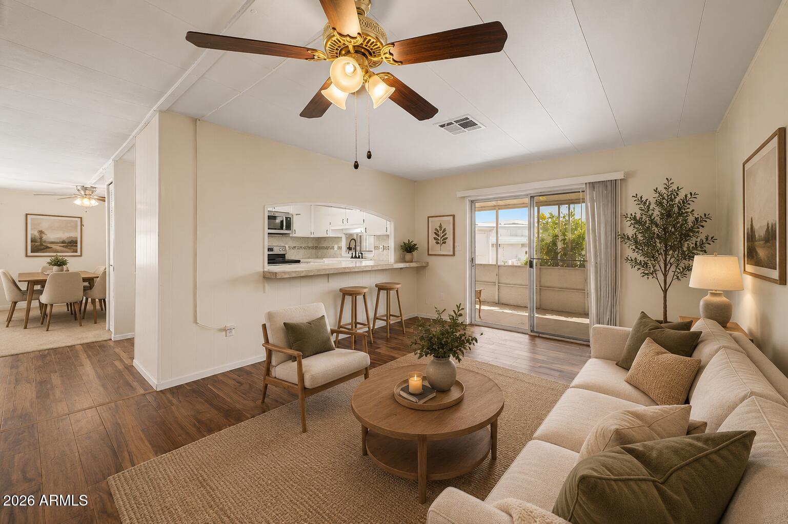 Welcome to this beautifully updated home in the sought-after Apollo Village, perfectly positioned on an expansive corner lot. Thoughtfully refreshed with elegant touches throughout, this move-in-ready residence features fresh interior paint, new laminate flooring in the hallway and bathroom, and the added comfort of two AC units for year-round efficiency. Step inside to discover an impressively spacious living room, oversized bedrooms, and beautifully updated kitchen and bathrooms designed for both comfort and style. The screened-in porch creates the perfect place to relax and unwind, while the outdoor sitting area and large storage shed add even more functionality and charm.Residents of this vibrant 55+ community enjoy exceptional amenities including a heated pool, spa, and clubhouse, making this home an incredible opportunity to enjoy comfort, convenience, and an active lifestyle at an outstanding value.