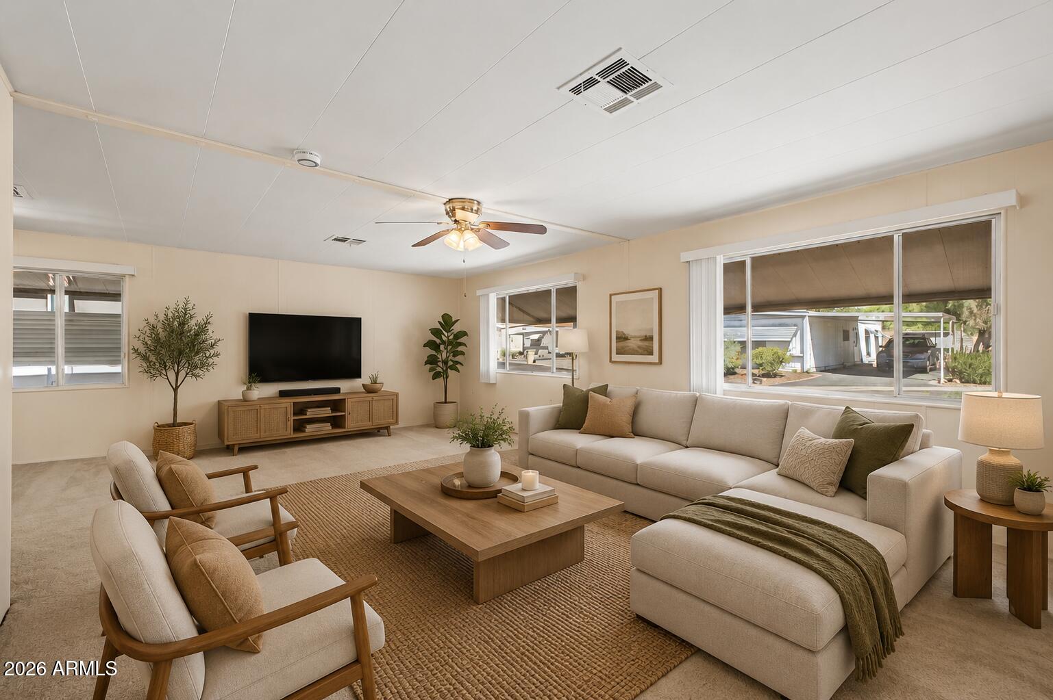 Welcome to this beautifully updated home in the sought-after Apollo Village, perfectly positioned on an expansive corner lot. Thoughtfully refreshed with elegant touches throughout, this move-in-ready residence features fresh interior paint, new laminate flooring in the hallway and bathroom, and the added comfort of two AC units for year-round efficiency. Step inside to discover an impressively spacious living room, oversized bedrooms, and beautifully updated kitchen and bathrooms designed for both comfort and style. The screened-in porch creates the perfect place to relax and unwind, while the outdoor sitting area and large storage shed add even more functionality and charm.Residents of this vibrant 55+ community enjoy exceptional amenities including a heated pool, spa, and clubhouse, making this home an incredible opportunity to enjoy comfort, convenience, and an active lifestyle at an outstanding value.