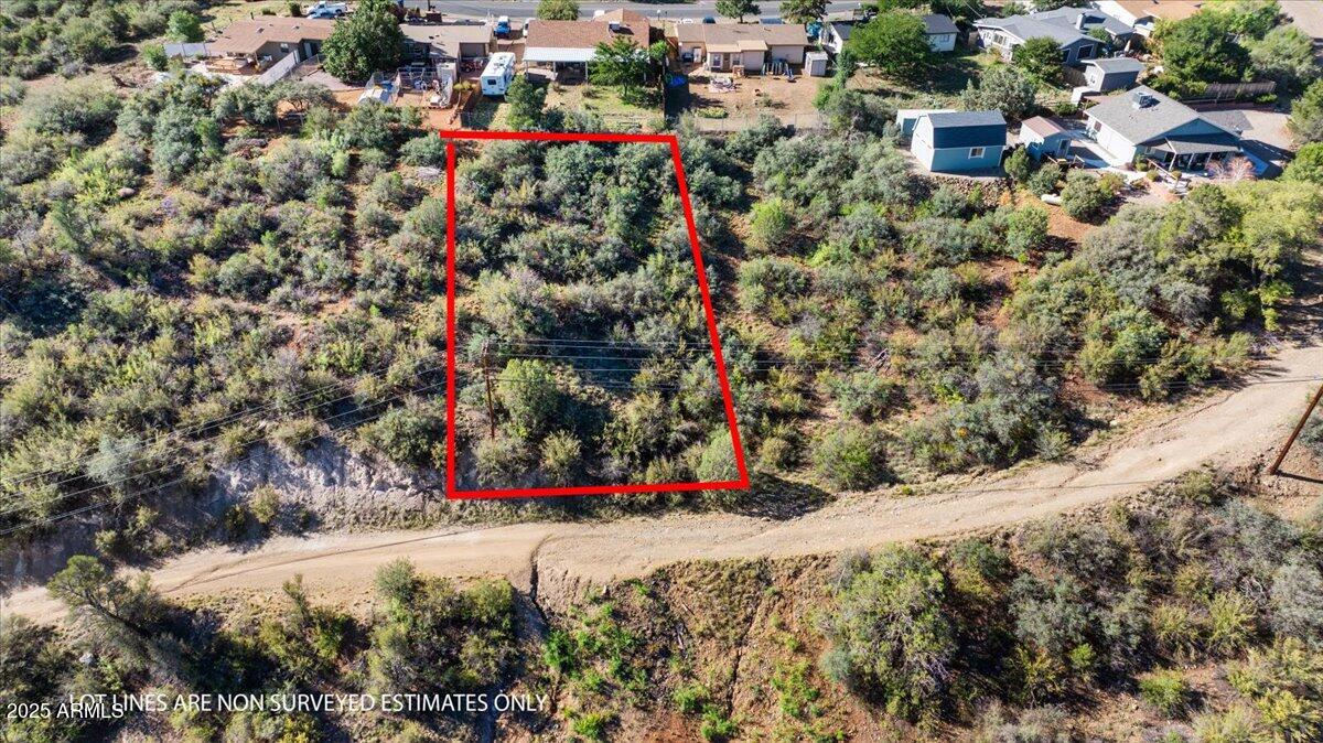 Welcome to 1601 N Emerald Drive, a beautiful 0.19 acre parcel in the heart of Diamond Valley in Prescott AZ. This lot offers a perfect blend of peaceful living and convenience, nestled on a quiet street with stunning views of the Mingus Mountains, San Francisco Peaks, and expansive panoramic vistas. Gently sloped and ready for your vision, this property is ideal for building a custom site built home that takes full advantage of the natural landscape and awe inspiring surroundings.

Set back just far enough from the city to enjoy peaceful starry nights, yet close enough for a quick trip to shopping, dining, and local amenities, this lot truly offers the best of both worlds. Located on a county maintained road, you'll have reliable access year round. Utilities including electricity, private water, propane, and cable TV are available nearby, making your future build even easier to plan.

Zoned for residential use and with no HOA, this lot gives you freedom and flexibility without restrictions. Whether you're planning your forever home or a quiet mountain getaway, this lot offers an amazing opportunity to make your real estate dreams a reality.

Looking for more space? The adjacent lot is also available, giving you the option to expand your footprint and create an even more private retreat.

Come walk the property and picture your future home among the beauty of Prescott's natural landscape. This is a must see.