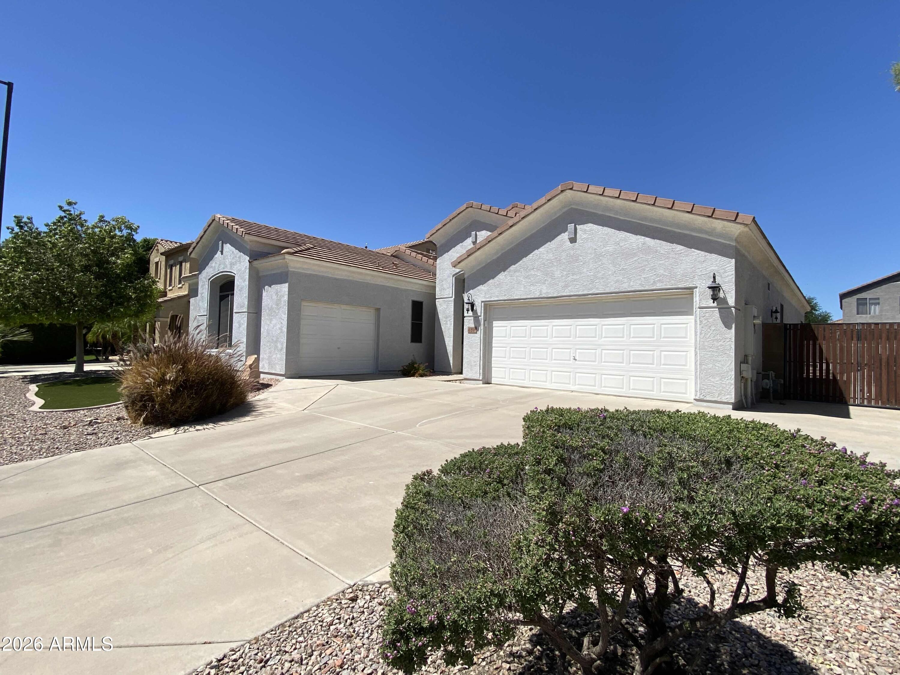 Welcome in to this Meticulously maintained 4 bedroom home!  Pride of Ownerships Shows Throughout - the Spacious Living Area Encompasses the Kitchen, Separate Eating Area and Family Room.  The Primary Suite Provides Access to the Back Yard.  The Primary Bath offers Dual Sinks, Separate Tub/Shower and Walk-in Closet.  There is a 3 Car Garage + an RV Gate in Front and a Good Sized Yard in back.  The 4th Bedroom is currently used as an Office but can Easily be Converted back to a Bedroom.  Newer AC Units complete the Home.