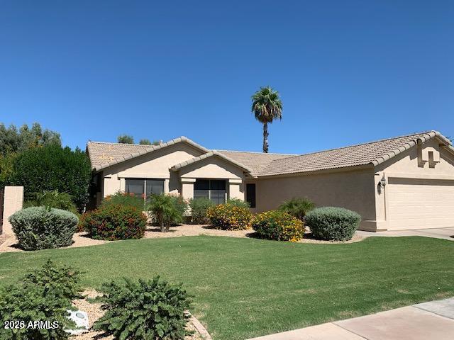 Lovely home nestled in prestigious Ocotillo LAKE & GOLF Neighborhood! VAULTED CEILINGS are featured in the separate living, dining & family rooms. Tile in all the right places, GRANITE COUNTERTOPS with new sinks & faucets throughout.  New light fixtures throughout. PLANTATION SHUTTERS & blinds in all windows. Spacious kitchen w/ bayed breakfast nook has GE STAINLESS APPLIANCES ~ Upgraded cabinets w/ pullout shelves. BAYED master suite w/ walk in closet and EN SUITE bathroom with DOUBLE SINKS, separate shower and garden tub. Ceiling fans & MULTI ZONE A/C unit. 2 car garage w/ 4' extension & built in cabinets. Private backyard and mature landscaping front and back ~TUFFSHED conveys. New water heater 2023 New HVAC 2021