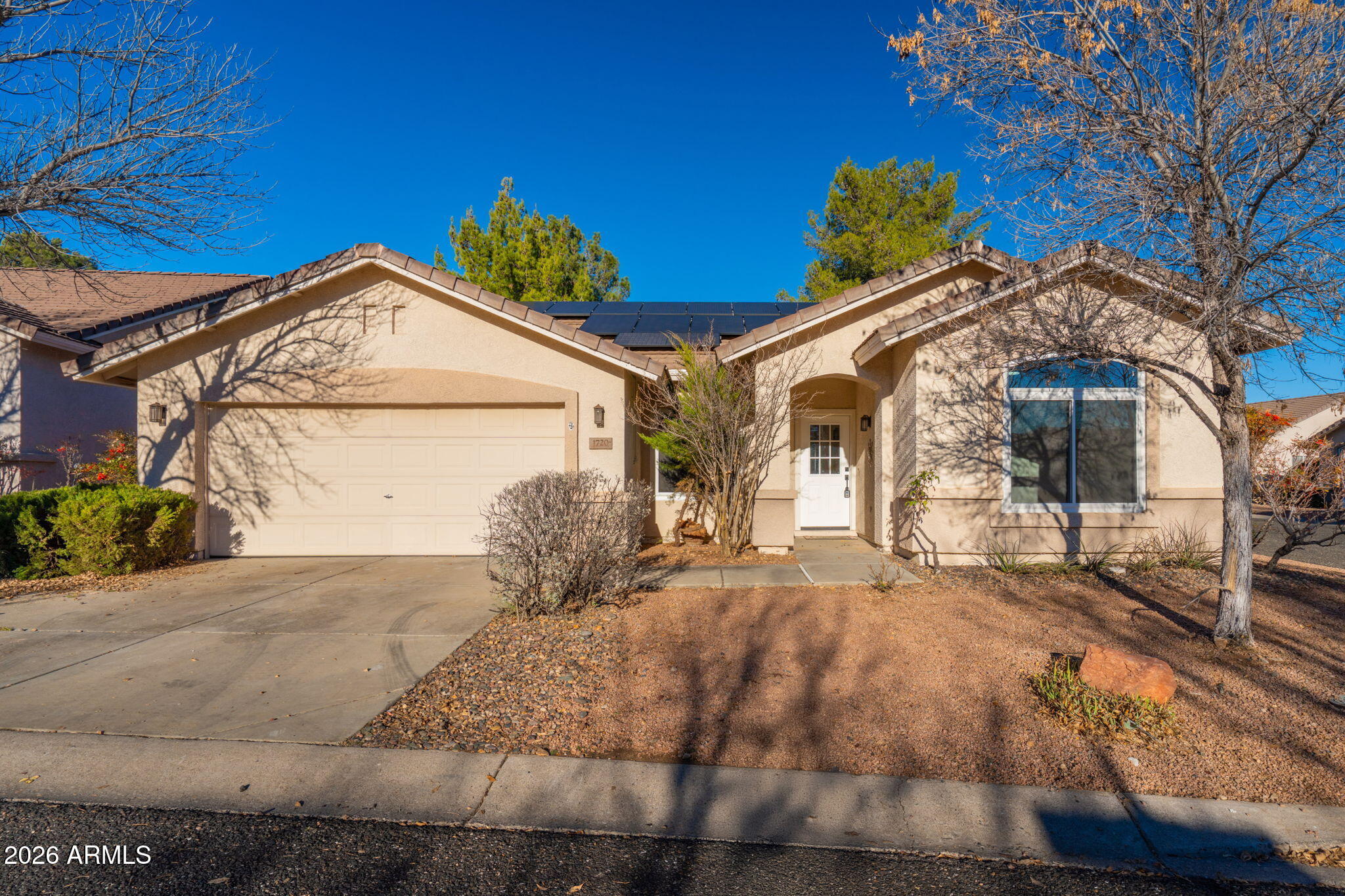 Beautifully updated single-family home in the desirable Cottonwood Ranch neighborhood. This home has it all! Freshly painted interior, granite countertops, stainless steel appliances. Fully renovated bathrooms.  Brand new windows, new roof, a new TRANE A/C unit. Bright, functional layout with abundant natural light. OWNED SOLAR SYSTEM ensuring cheap utility bills for years to come! Located in a quiet, established community close to parks, schools, shopping, dining, and all that the Verde Valley has to offer.