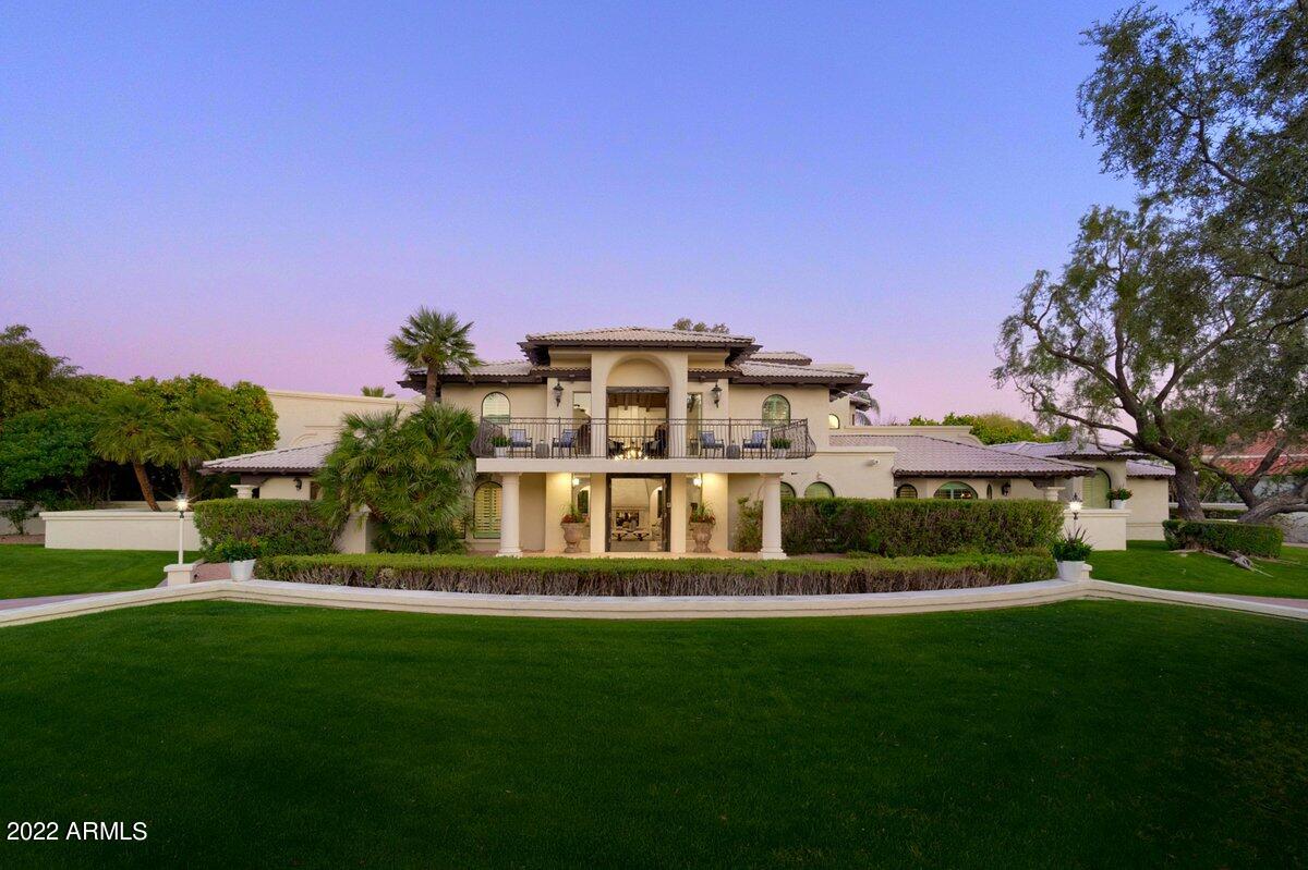 Welcome to La Place, one of the most lush and private neighborhoods in Arizona. This executive retreat was designed and built to entertain, yet offers privacy & relaxation. One-of-a-kind estate where the current owner gutted and expanded: now six bedrooms plus office, library with bar and multiple balconies; all with  mountain views.  Chef's kitchen comes with fully equipped with full catering kitchen.  Three Bedrooms on main level & spacious office. Downstairs there's a movie theater room, 800+ bottle wine cellar and music/recording/podcast studio.  Upstairs offers secure and private master retreat, his & her baths, workout room and two bedrooms & lounging area with balcony, private BBQ & views to lush backyard.   Elevator takes you from wine cellar to main floor, to private master suite.