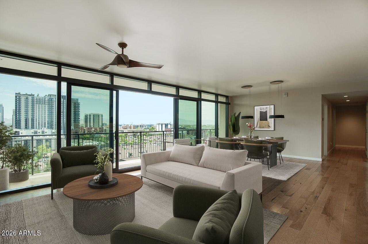 UNICORN ALERT! Come fall head over heels for this stunning urban dwelling! Spectacular views from every room of the vibrant (and growing!) downtown Phoenix skyline! It is almost magical day or night! Imagine watching the 4th of July fireworks or the monsoon storms rolling in, you can capture it all from your dining room chair! Open kitchen with induction stove, wine fridge, wood floors t/o, this is just the perfect floor plan. Split bedrooms with 2 on one side and the primary down its own hallway. The community is top notch and one of the best in the Valley! Pool/Gym/Rooftop/24 hour Staff, it is all here to pamper you! Walk to restaurants, coffee shops, parks, venues, art and more! A perfect place for somebody who loves the energy of urban living!