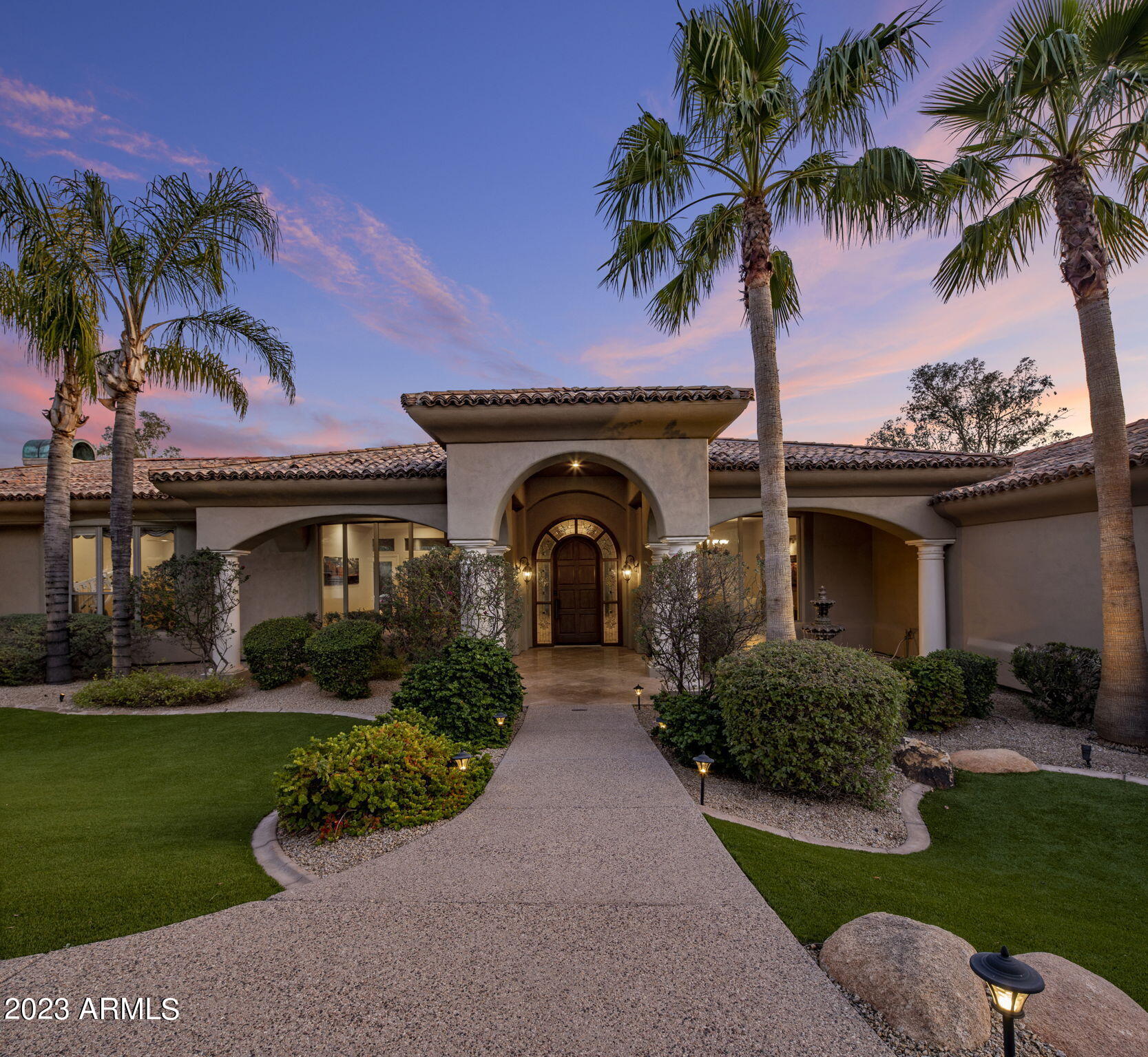STUNNING CAMELBACK MOUNTAIN VIEWS FROM THIS N/S PV LOCATION***MINUTES TO BEST RESTAURANTS/SHOPPING & AMENITIES. RECENT UPDATES OF STACKING DOORS BRINGS A SEAMLESS TRANSITION FROM INDOORS TO OUTDOORS FOR LIFESTYLE LIVING - BUILT-IN BBQ/COMMERCIAL MISTING SYSTEM/ENTERTAINMENT TV'S/ALEXA HOME & MORE.  SOARING CEILING HEIGHTS/SPLIT FLOOR PLAN WITH PRIMARY/OFFICE + 3 ADDT'L BRMS. GOURMET KITCHEN W/GAS COOKTOP/PREMIUM APPLIANCES/WETBAR/WINE/& BUTLER'S PANTRY. SANCTUARY PRIMARY SUITE/SITTING/FIREPLACE/& ENORMOUS CLOSET.  4-CAR GARAGE/TONS OF STORAGE. POOL/SPA/FIRE PIT & LOW MAINTENANCE ARTIFICIAL TURF & LUSH LANDSCAPING.   THIS HOME WAS BUILT FOR PRIVACY AND MAXIMUM VIEWS & ENJOYMENT OF THE EAST CAMELBACK MOUNTAIN VIEWS.