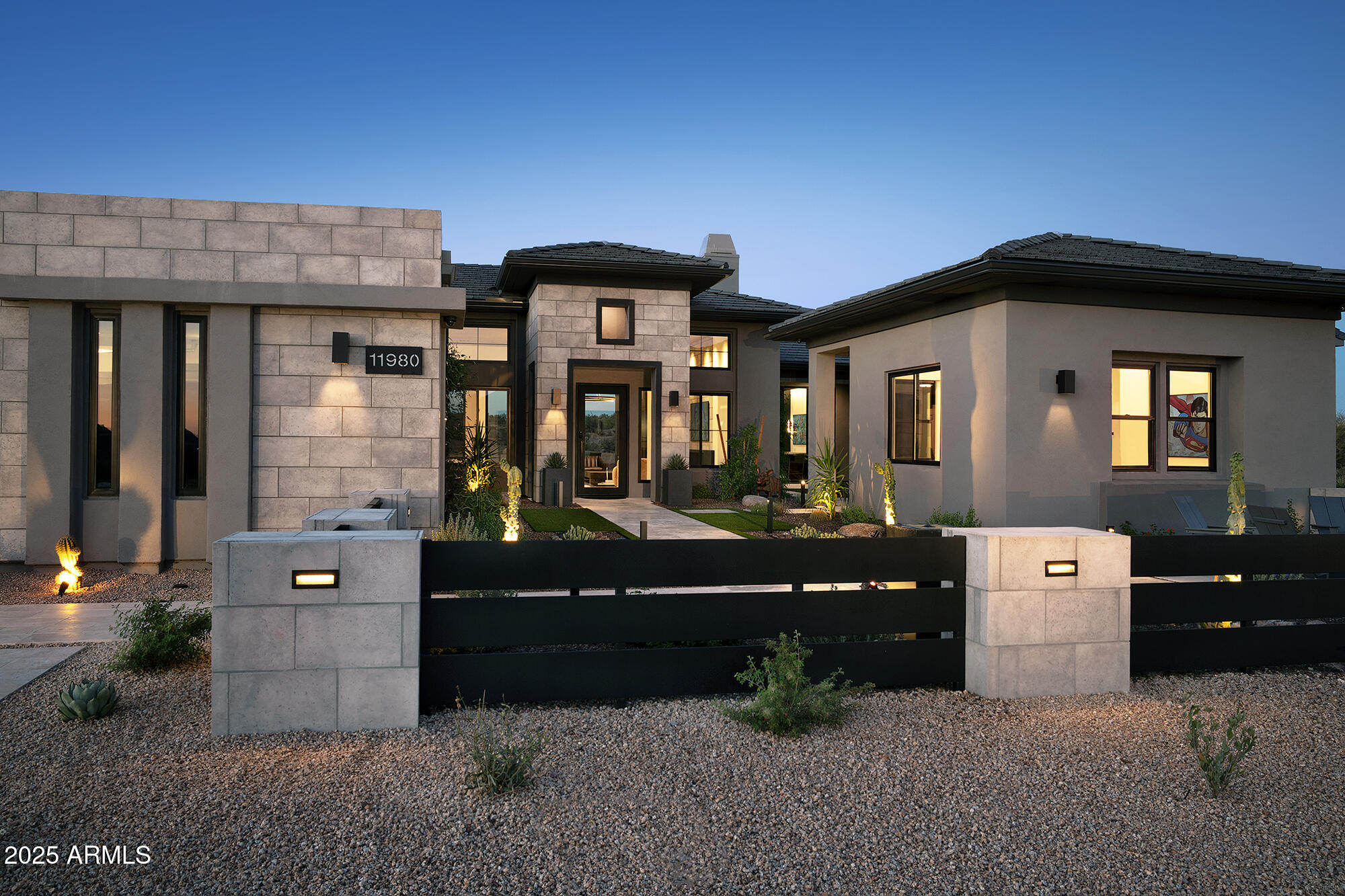 This newly built single-level contemporary offers 4,762/sf of refined living on a 1 acre cul-de-sac homesite in gated Ranch Gate Estates. Its privacy is assured as it borders to more than 500 acres of State Land and the McDowell Sonoran Preserve. The luxurious open floor plan includes 4 bedrooms, 4.5 baths, and a 625/sf casita. Over $900,000 in upgrades (see upgrade list in Documents folder) highlight the home's craftsmanship and quality. The great room features a linear fireplace and tongue-and-groove ceilings which opens to a chef's kitchen with a waterfall quartzite center island, Sub-Zero and Wolf appliances and custom cabinetry. The formal dining room includes a built-in buffet. The media room includes a wet bar and dual wine fridges. The primary suite offers a spa-inspired bath... with soaking tub, glass shower, floating vanities, and floor-to-ceiling stonework. The custom California Closets dressing room with center island provides boutique-style organization. The office includes tailored built-ins. Two laundry areas and a four-car garage complete the layout. The home includes Control4 smart home technology controlling audio, video, lighting, window shades, and security. The front courtyard includes a sitting area overlooking the breathtaking McDowell mountain views, tranquil meditation pool, lush landscaping, fire pit and water feature. Located near the McDowell Sonoran Preserve with 75+ miles of hiking trails, and within minutes of top golf courses, dining, and shopping, this property delivers privacy, elegance, and modern desert living. Price includes a $100k allowance towards pool.
