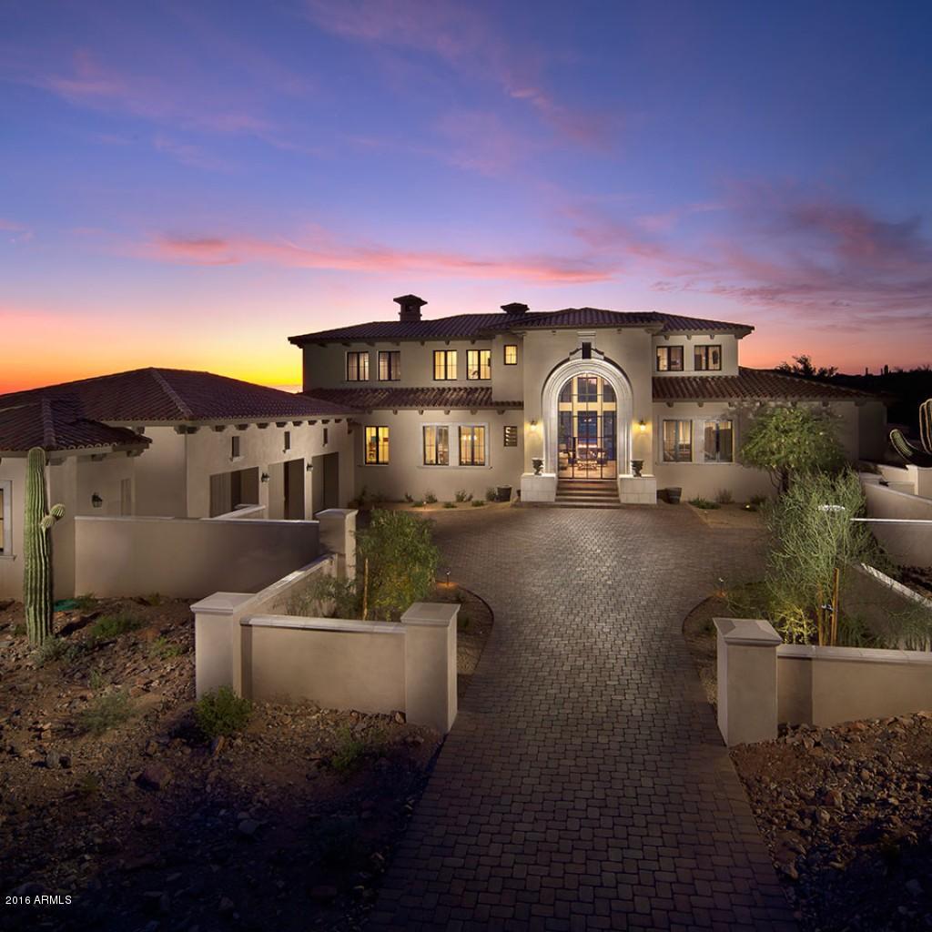 This immaculate custom contemporary is nestled in the prestigious Horseshoe Canyon of Silverleaf. Only the finest finishes were used, such as Misty Carrera Honed Caesarstone, Riptide Leather Quartzite & Crema Europa Polished Limestone. This barely lived-in estate encompassing over 1.2 coveted acres. Master suite provides unobstructed views of Camelback Mtn w/ a private patio overlooking the McDowells & city lights. The backyard mirrors a 5 star resort w/ chiseled edged pavers, heated pool & spa w/ fire feature, sport court, outdoor kitchen, in-ground trampoline & outdoor shower. A separate entrance casita allows guests to enjoy their own space while taking in the amazing view. La dolce vita!
