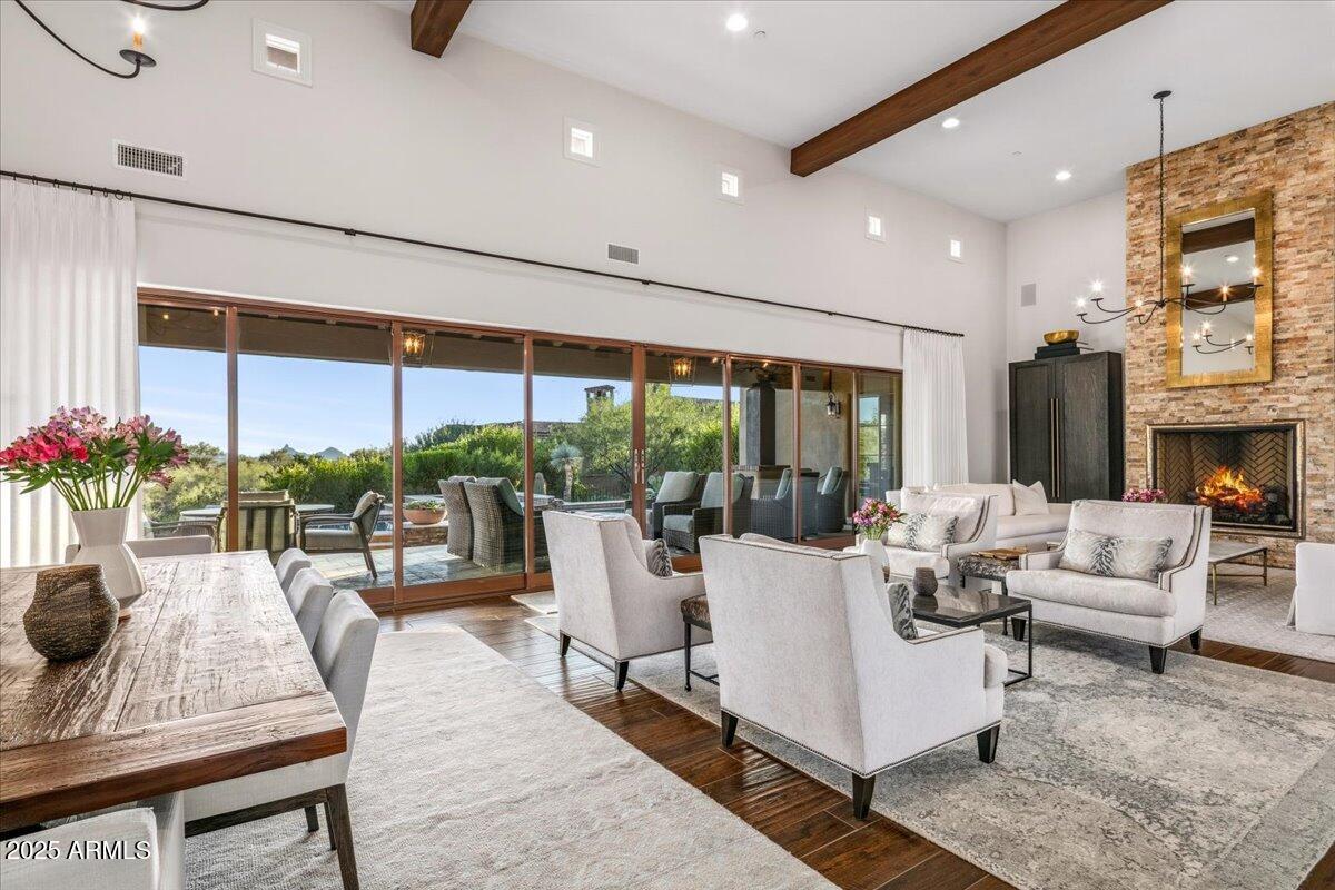Golf membership could available, depending on the offer terms and subject to the Mirabel Club bylaws. Designed for the way luxury is lived today - open, seamless, and beautifully connected to the desert. Perfectly positioned on a premium south-facing lot in the prestigious Mirabel Club, capturing unobstructed Pinnacle Peak and desert-preserve views. An expansive great-room design is anchored by soaring ceilings and a dramatic wall of pocket doors that dissolve the boundary between indoors and the resort-style backyard with a sparkling pool, raised spa, fire features, and a fully appointed outdoor kitchen. Elegant architectural details elevate every space: featuring tongue-and-groove ceilings, refined shiplap accents. Furniture available under separate bill of sale. The oversized casita offers a private entry, kitchenette, and ideal separation for guests.
List of upgrades include: 
"	New HVAC system + air conditioners in garage (1 year old)
"	Landscape additions and lights
"	Moen water detection system for whole house + casita 
"	31 light dimmers installed
"	Updated audio visual in house
"	Full house + casita security system and monitoring by ADT
"	House exterior painted 1½ year ago
"	Tinted window film in house & garage
