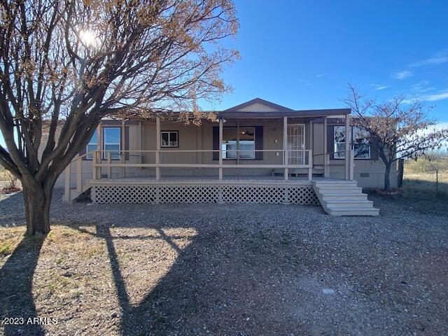 Freshly painted home 1700+sq.ft. 3 Bedroom 2 Bath split floor plan large kitchen on  4 acres Enjoy panoramic mountain view from ex large front covered porch.
