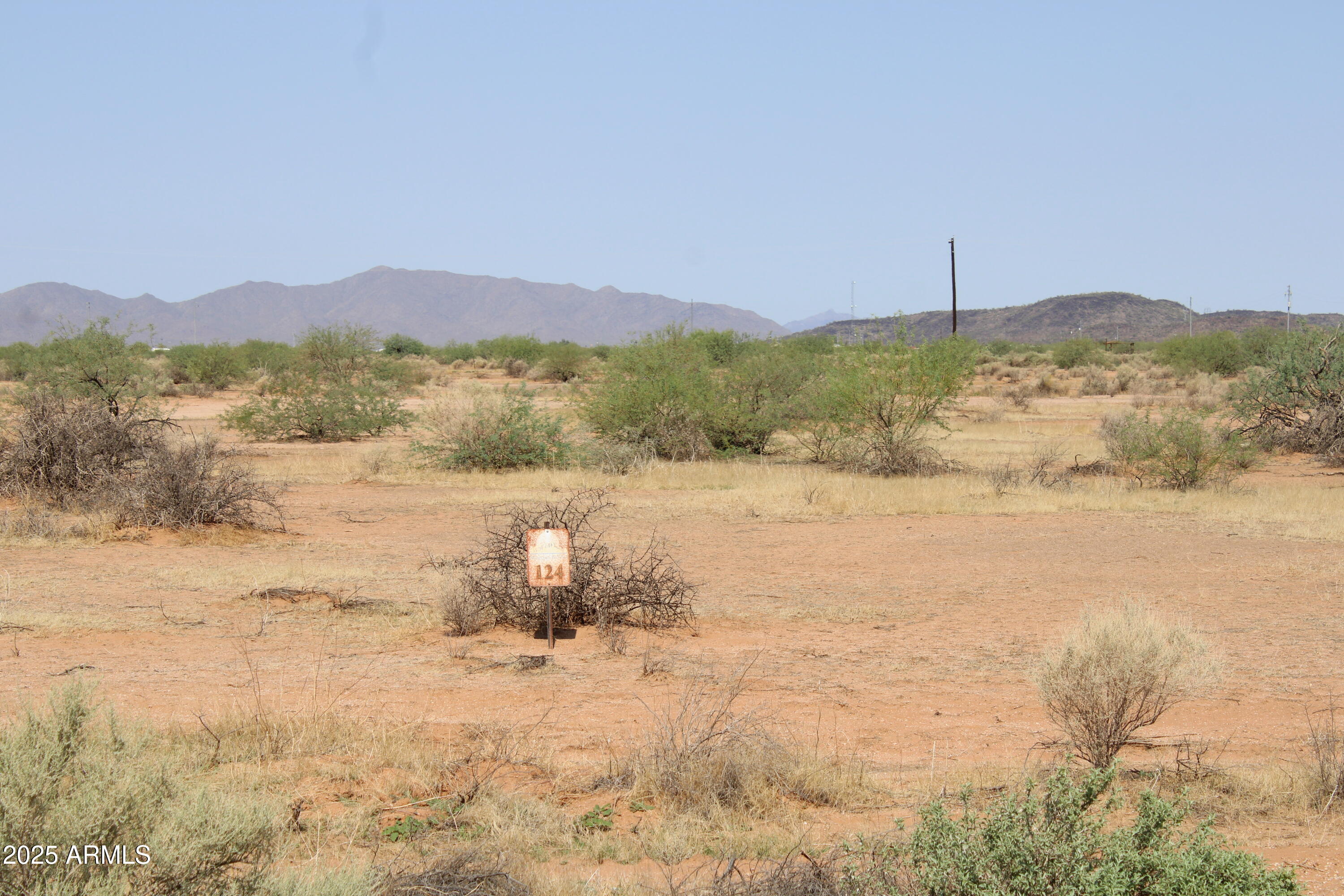 Discover the perfect opportunity to build your dream home on this 1.385-acre lot in Eloy! This property is ready to be developed with paved road access, water, and power available at the lot line. Surrounded by mountain views and endless outdoor adventures, you'll enjoy being close to Picacho Peak State Park, Skydive Arizona, and Saguaro National Park. A true blank canvas for your vision, this spacious lot offers the peace of desert living with easy access to I-10, Casa Grande, and Tucson. Don't miss your chance to own a piece of Arizona's natural beauty!