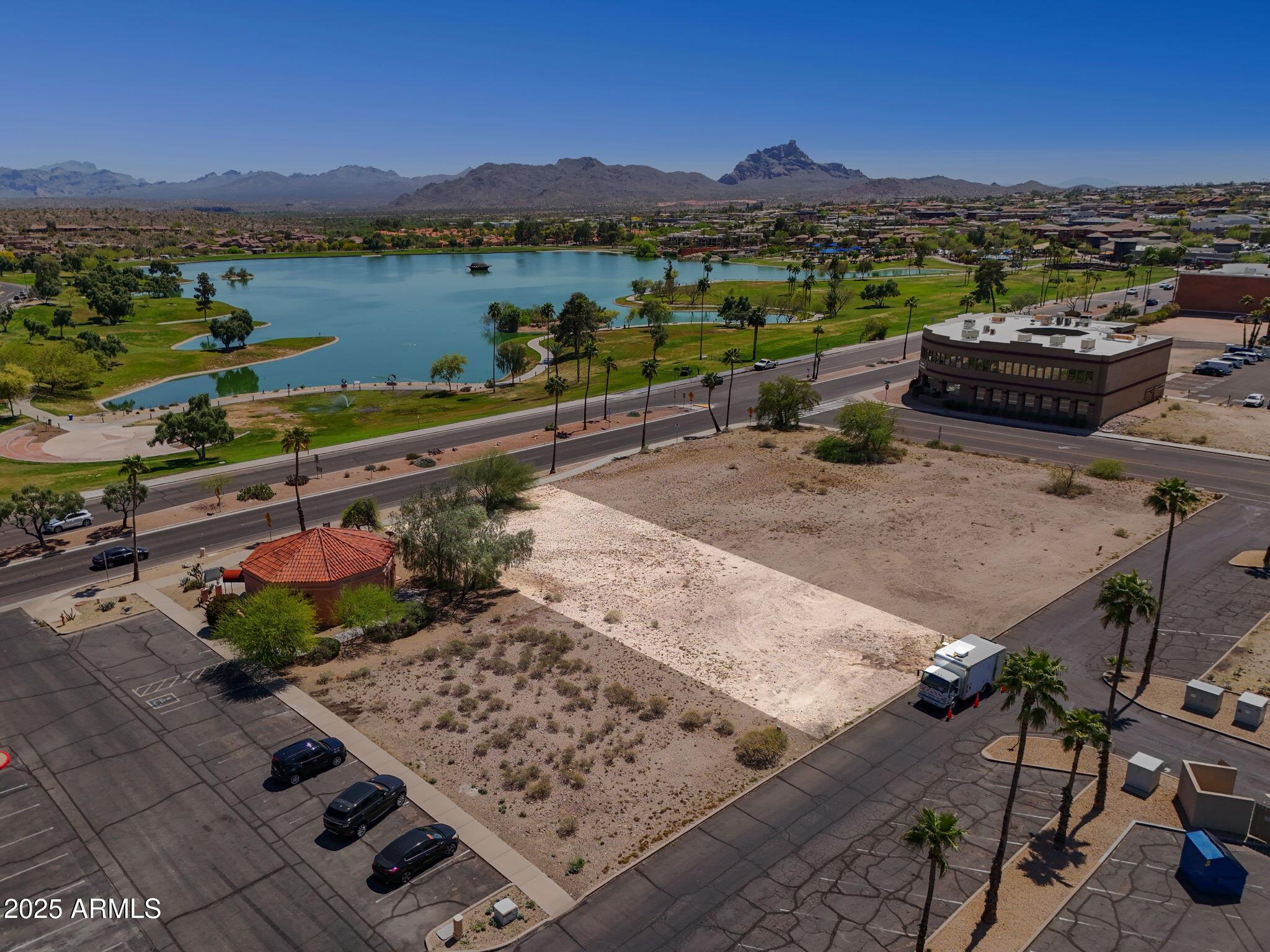 Great commercial or mixed-use development lot across from Fountain Park.  Perfect for restaurant location, retail or take advantage of recent Live-Work ordinance to create stunning downtown condos in this mixed-use setting in a vibrant, growing zip code.