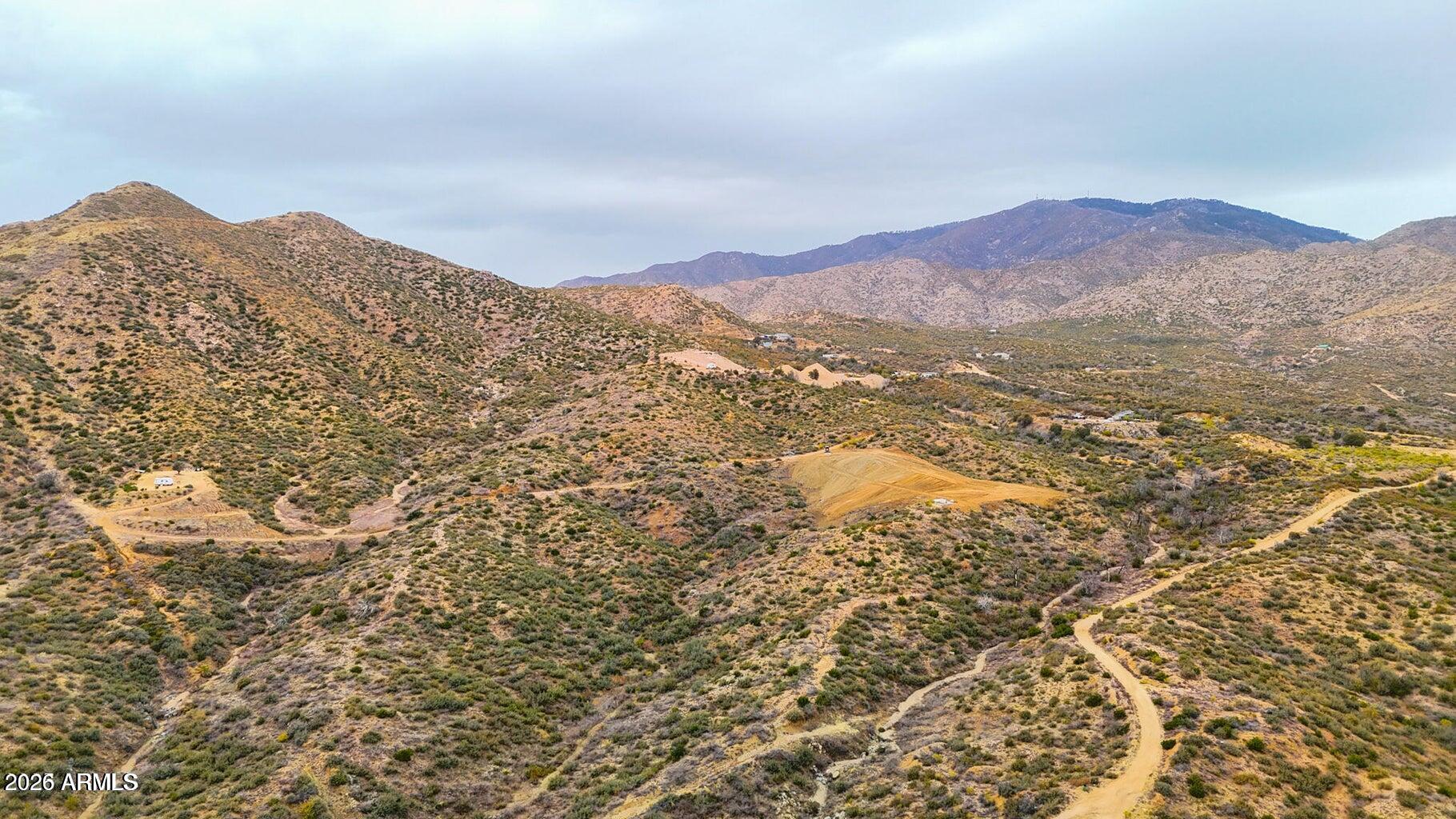 Awesome hilltop property with stunning surrounding mountain views. 15 minutes from Globe making this a perfect new investment to buy and hold or a great place for your new home. SELLER FINANCING AVAILABLE with only a 3,400 down payment. 
Gated community... phone, email or text agents for code.