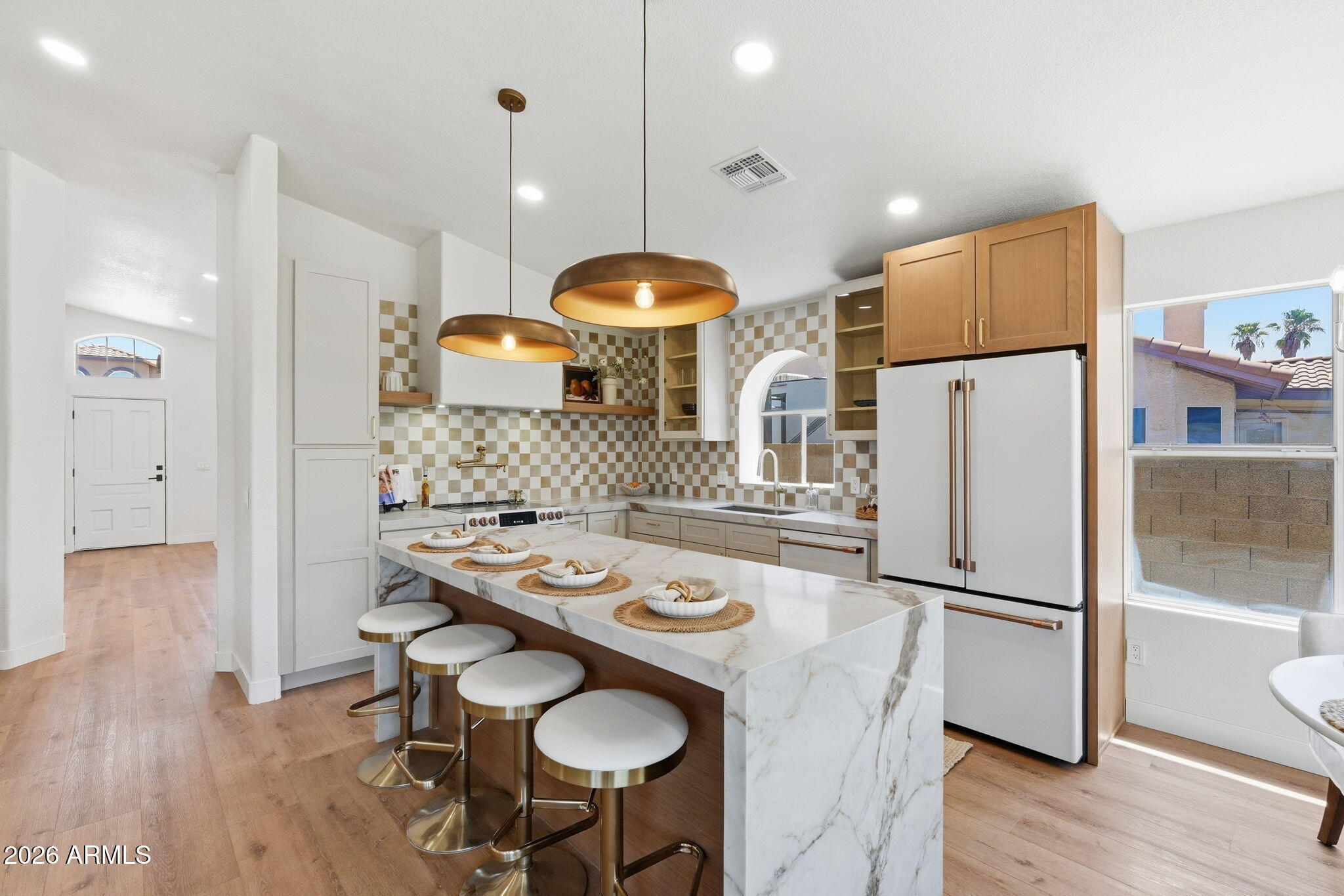 Scottsdale living at its finest!! Located in one of Scottsdale's most sought-after pockets at Thunderbird & 56th, this stunning 4-bedroom, 2-bathroom home checks every box. Just minutes from Scottsdale's premier golf, dining, shopping, and entertainment destinations. The location alone is hard to beat.
Inside, you'll find a beautifully updated interior featuring a custom kitchen with a show-stopping waterfall quartz island, premium Café appliances, and wide plank flooring throughout -- with finishes that feel both modern and timeless.
Outside, enjoy your own private retreat, begins with freshly updated modern landscaping in the front yard, a sparkling pool, and a 3-car garage to round it all out.
This one truly has it all. Come see it before it's gone.