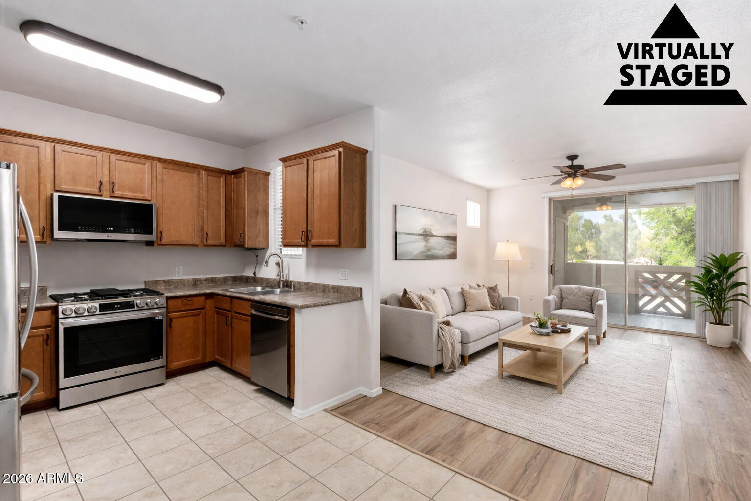 Highly desirable LOCK & LEAVE Condominium with 1-CAR Covered Carport in the exclusive Terra Vista at Tatum Ranch. Close to many NEARBY amenities and the Tatum Ranch Golf Club, Open Floorplan with 1 Bed and 1 Bath, Laundry with lots of Cabinetry Storage, Kitchen with Breakfast Bar, NEW Stainless Steel Appliances. Gas Stove, French Door Refrigerator, Great Room, Oversized View Windows, LVP and Tile Flooring, Laundry with Extra Storage, Washer & Dryer Included & So much more! Enjoy Resort Style Living with Private Covered Patio. Featuring Heated Pool & SPA, Business & Fitness Centers, & Close to Everything Exciting - MUST SEE! Motivated seller looking at all offers.