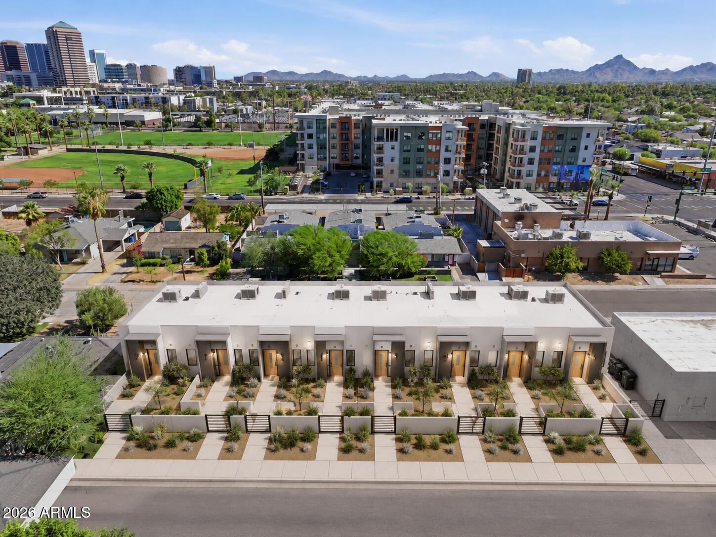 Prime Central Phoenix Development Opportunity 
Positioned in a highly desirable central Phoenix setting, this 15,666-square-foot (0.36-acre) C-1 zoned parcel offers a compelling opportunity for an investor, developer, or owner-user seeking a well-located infill site. The property sits within an established neighborhood near major employment, dining, retail, and the downtown core, with city and mountain views visible from the site. The level, rectangular lot provides excellent flexibility for a thoughtfully designed commercial or residential-style development, subject to City of Phoenix review and approvals. Concept imagery illustrates the potential for a contemporary single-level 10-unit courtyard-style project, featuring clean modern architecture, private front entries, desert landscaping, and a polished streetscape presence.
Existing public-record sources describe the site as approximately 0.36 acres / 15,666 square feet, with C-1 zoning and a prior 2,483-square-foot commercial improvement. Buyers should independently verify zoning, permitted uses, utilities, setbacks, parking requirements, density, and all development feasibility with the City of Phoenix.
