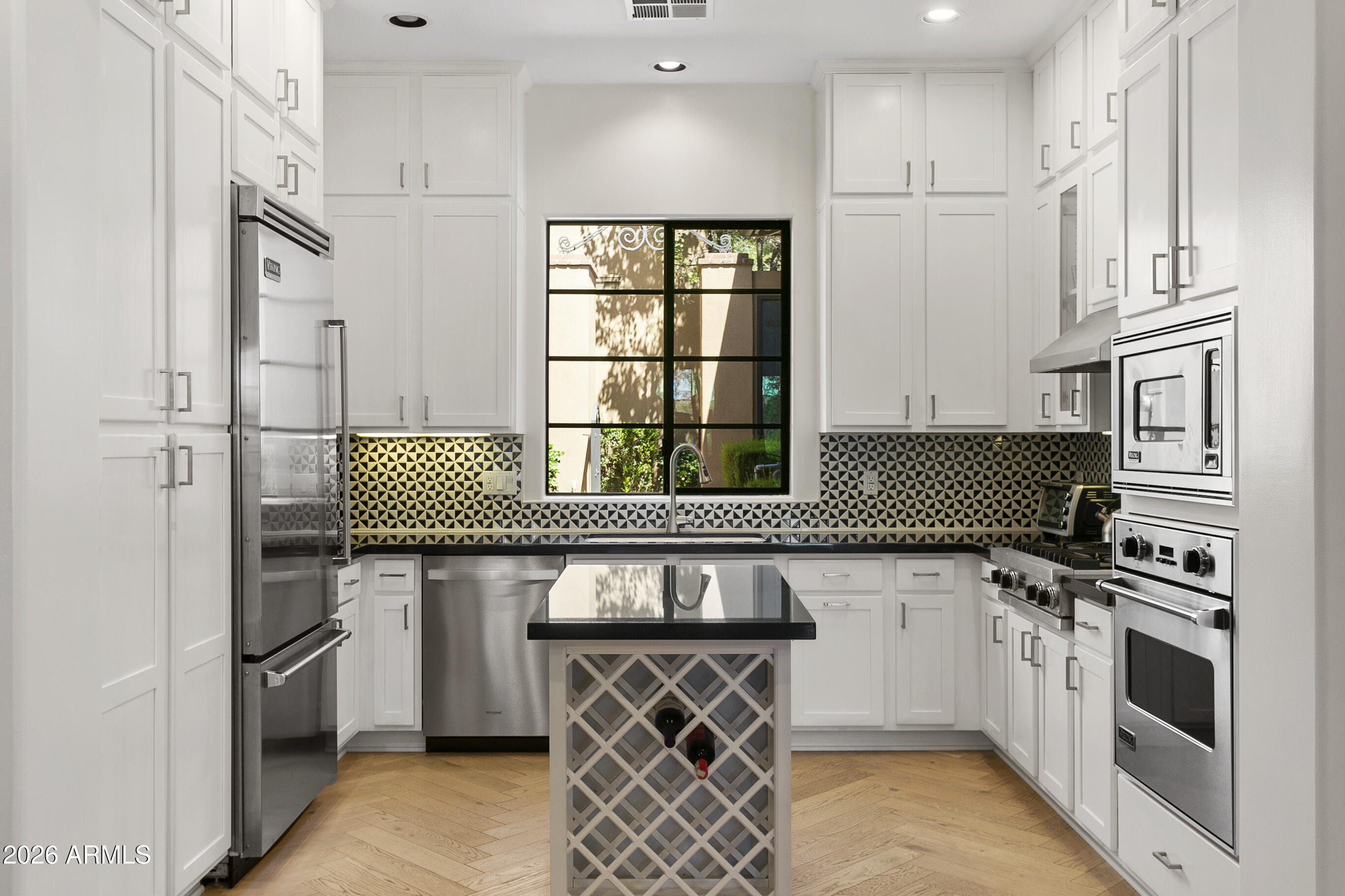 Gorgeous DC Ranch Villa with private pool and spa available for luxurious Scottsdale living. This spectacular open concept, single level property has been rehabbed throughout with striking designer finishes. Inviting floor plan, dramatic beamed ceilings, chefs kitchen, high end appliances, and overall caliber of remodel is jaw dropping. Inspiring master retreat boasts gorgeous bathroom, large custom walk-in closet, and walks out to picturesque outdoor space. This one-of-a-kind home on premiere lot offers guests their own private resort experience with heated pool and spa in backyard oasis that backs to community trail. Quiet, upscale, gated community affords sophisticated lifestyle with dining, hiking, golf, spring training, and world class shopping nearby.
