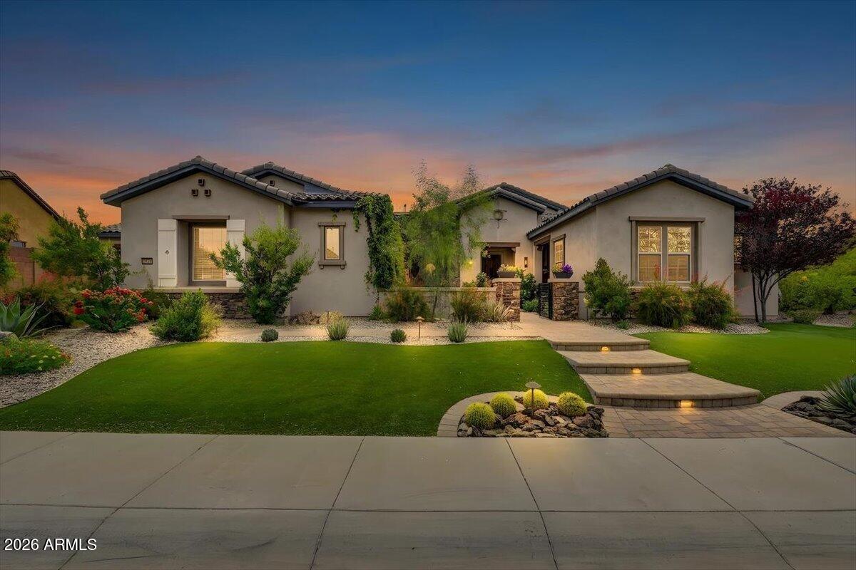 Amazing courtyard welcomes you to this fabulous 3-bedroom home, plus a large rec room and a private 1-bedroom guest casita, set on a large lot backing to desert open space for ultimate privacy. Enjoy a spectacular heated pool & spa with water feature, two outdoor fireplaces, outdoor kitchen, heaters, misters, beautiful travertine patio, bocce court, and in-ground trampoline. Open floor plan with wall of glass opening to the resort-style backyard. Split bedroom layout, chef's kitchen with gorgeous cabinetry, and a 4-car insulated & air-conditioned garage.Perfect for entertaining and everyday living!  Much sought after gated Neighborhood with great parks!