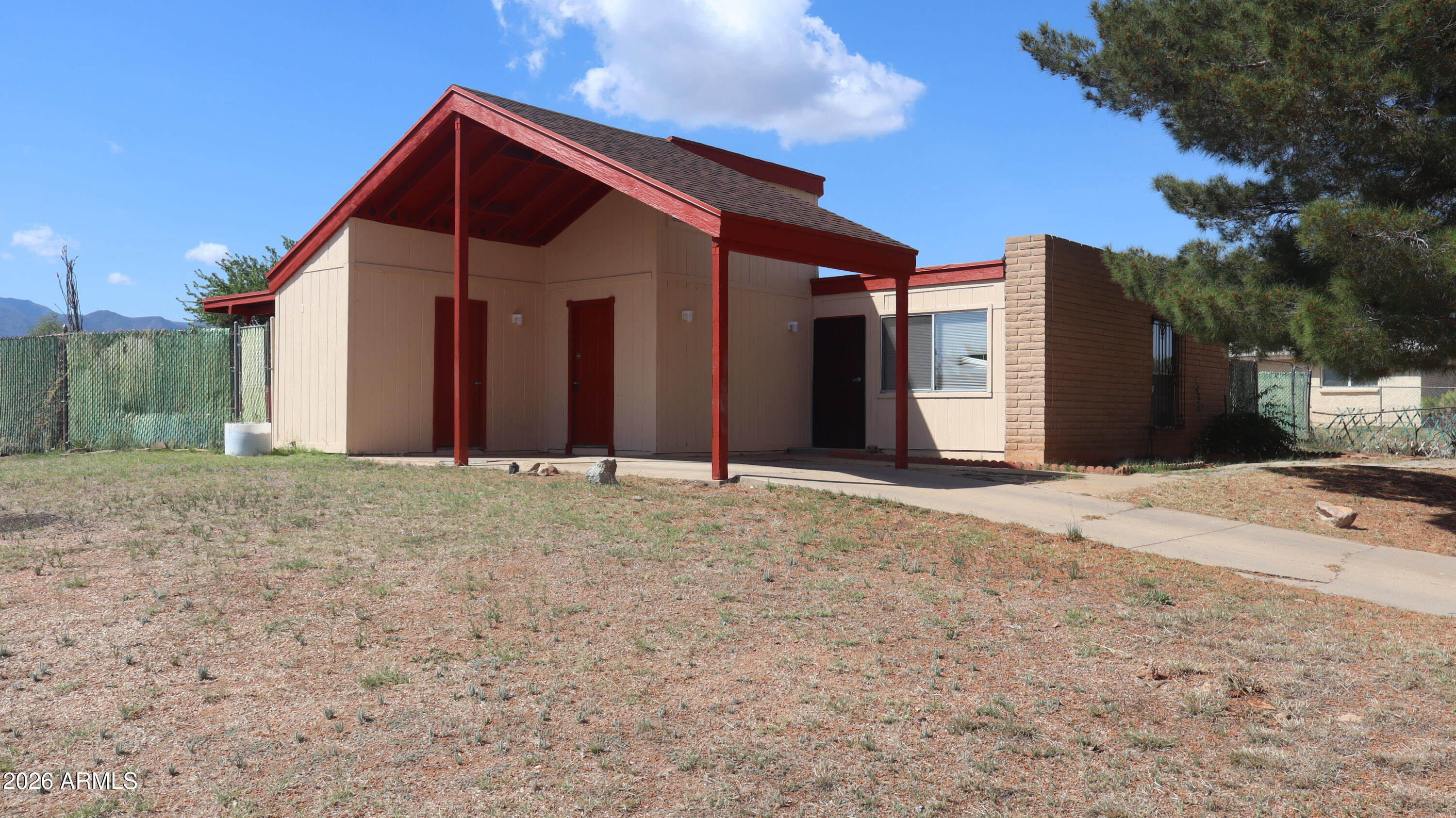 Here is your chance to own a 4 bedroom home with an inground pool in Sierra Vista at an affordable price. Home has been recently painted inside and out and looks marvelous. The pool is serviced professionally on a weekly basis. There is also a covered back patio adjacent to the pool to make it more enjoyable. If you need or want a workshop , this home is for you. 
Very easy to show or preview.