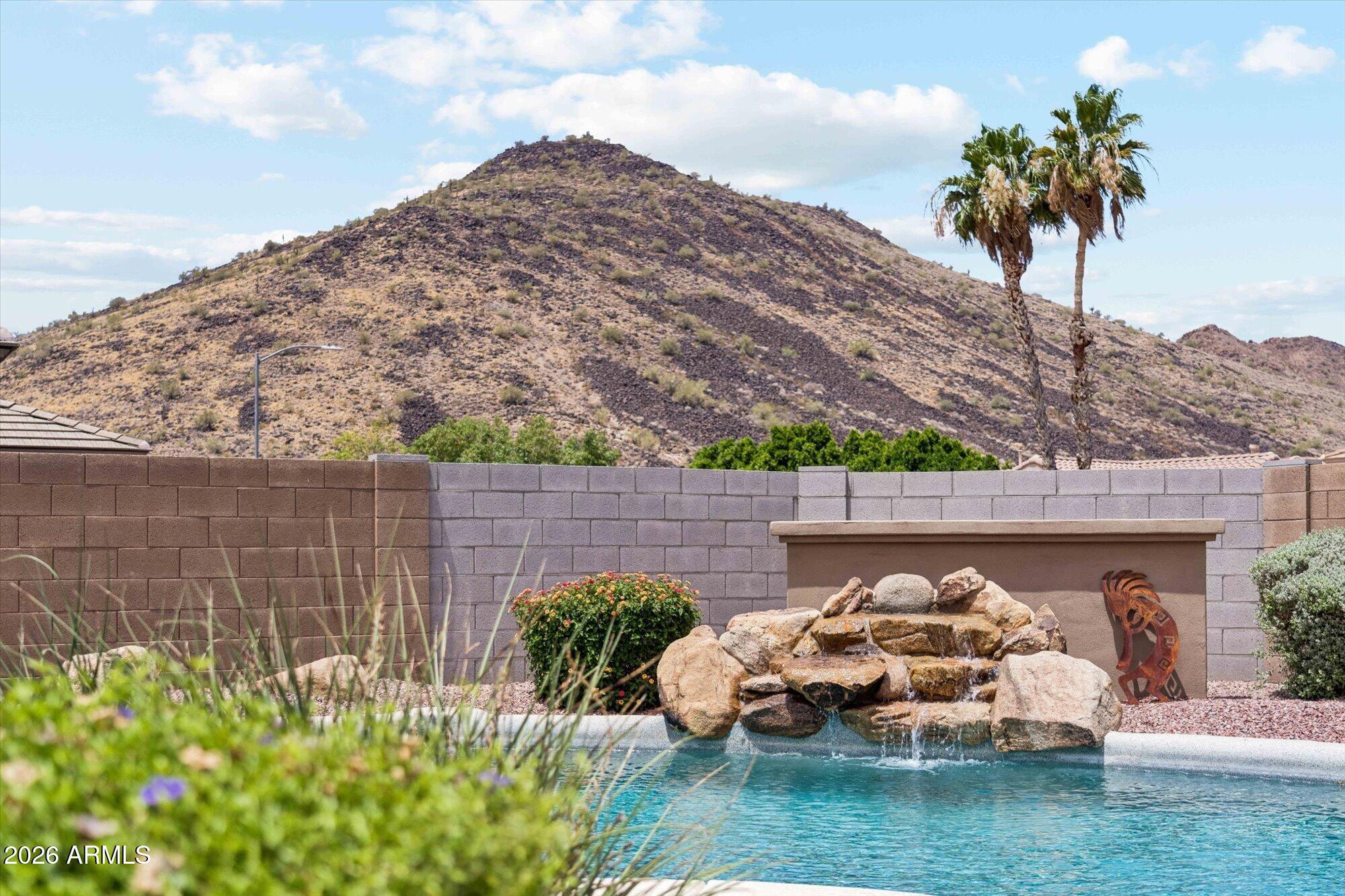 Beautiful property located in popular Stetson Valley, with stunning mountain views.  Oversized lot with beautiful landscaping in front and back with PVC watering system. Enjoy the generous backyard and sparkling pool. Fabulous front door and shutters throughout the home. Spacious kitchen with built in refrigerator, double ovens and gas cook top! Large Master Retreat. Master Bath has a walk in shower and 6' garden tub with a walk in closet.  Plenty of room in the 2ft extended 3 car garage. So many great features in this well maintained home.