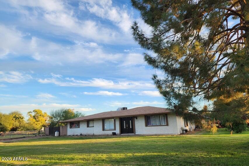 Rare find in the city -- 1-acre corner, fully irrigated horse property with NO HOA. Bring your horses, chickens, goats, RVs and toys and enjoy country charm without leaving the city 
Interior features:
3 bedrooms, 2 bathrooms
Dedicated office
Formal living room, family room and dining area with wood fireplace
Spacious kitchen with abundant counter space, stainless-steel appliances, double oven and mini fridge

Outdoor highlights:
Fully usable acre on a corner lot
Irrigation in place for pasture/garden
Room for guest house, barn, RV parking and outbuildings
Endless possibilities -- live the nostalgic farm lifestyle while staying in the city. 
DO NOT DISTURB TENANT