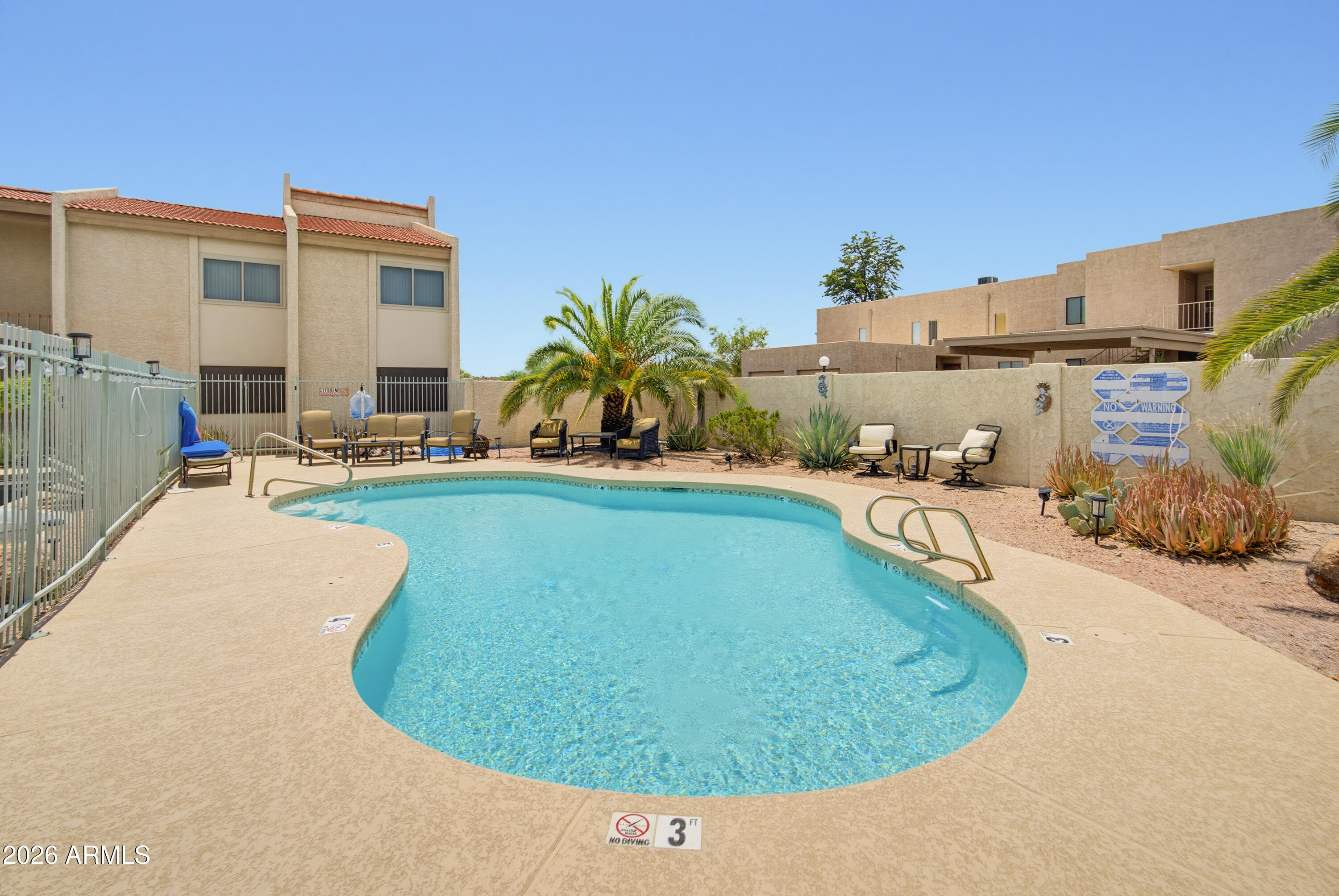 CURRENTLY OPERATING AS A SUCCESSFUL RENTAL AND BEING SOLD FULLY FURNISHED! Whether you're seeking an investment opportunity, seasonal getaway, or full-time residence, this beautifully maintained 2 bed, 2 bath condo offers exceptional flexibility in a community where short-term rentals are permitted. Ideally located in the heart of Fountain Hills, you're just a short walk from the world-famous Fountain, Avenue of the Fountains, restaurants, and Bashas' shopping center. Inside, the bright and open split floor plan features soaring ceilings, granite countertops, and abundant natural light. Step onto the spacious balcony and take in stunning views of the McDowell Mountains and even a glimpse of the iconic Fountain. Residents enjoy a charming community with a fenced sparkling pool and patio area perfect for relaxing or entertaining. Don't miss this rare opportunity to own a turnkey condo in one of Fountain Hills' most desirable locations!