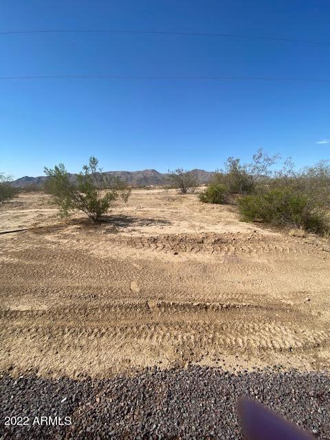 BRING ALL OFFERS!!!! 5 Acres available! Up and coming new area in Surprise. Sun valley Parkway and 219th Ave. Close to the Loop 303, Bell Rd, White Tank Regional Park, golf courses, horse trails and more! Parcel has utilities at road. City of Surprise water and sewer. Southwest gas and APS. Additional 5 acres available next door.  Away from the hustle and bustle. This beautiful property is surrounded by New Future Housing Developments. Property is ideal for custom homes Ranchettes, High density, or Shopping plaza or that Commercial project. Call Listing Agent for additional information