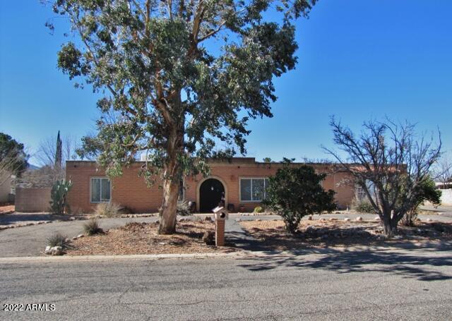 This spacious 4BR/2.5BA/1.5CG, 2501 sq.ft. home on almost half an acre is centrally located in Sierra Vista, AZ minutes from Ft. Huachuca, shopping, Town & Country Elementary and Joyce Clark Middle School.  The home includes a large bonus room, 2 living areas, a wood burning fireplace, tile throughout, a newer furnace and hot water heater.  There is an RV gate, block wall and storage units in the back yard as well.  This property is being sold as-is.  Call today.