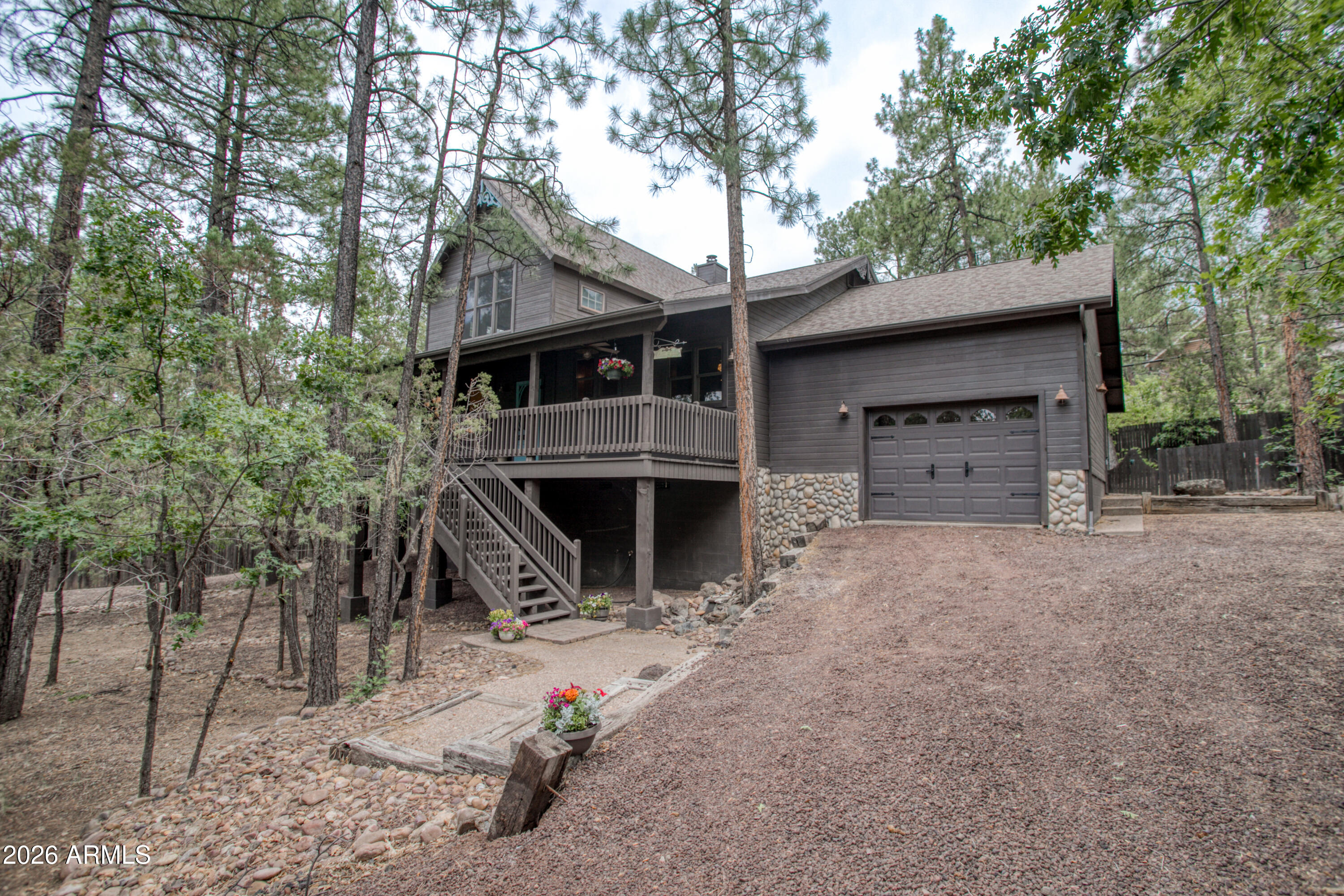Wonderful location in most desirable Blue Spruce Estates!  Custom built in 2003. Air conditioned. Vaulted ceilings, fireplace in large living room, wrap around covered deck for entertaining, The privacy and tree views are amazing. 2 bedrooms, 2 baths plus an enormous bunk room / loft which can sleep many or work as a family/game room. Attached 2 car garage w/ ample storage. Kitchen w/ stainless steel appliances, breakfast nook, pantry, farm sink. Master bedroom w/ separate exit to covered deck - bathroom w/ walk-in shower. 2nd bathroom has separate claw foot tub and walk in shower. Fenced backyard. No HOA. Super location close to restauarants in Pinetop-Lakeside, shopping, fishing, hiking. Enjoy all of the seasons in the White Mountains.