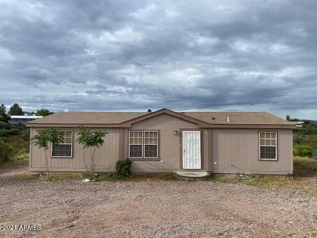 Beautiful 2006 3 bed 2 bath manufactured home within the city limits of Historic Tombstone Arizona. 

2 ADDITIONAL BONUS LOTS HAVE BEEN ADDED for a total of 1.704 acres. The home sits on parcel 94. Parcel 73A serves as a huge backyard and buffer between neighbors, and adjacent parcel 93 is a residential lot with electric hook ups and access to connect to city water for any neighbor you choose or none at all. See attached map.