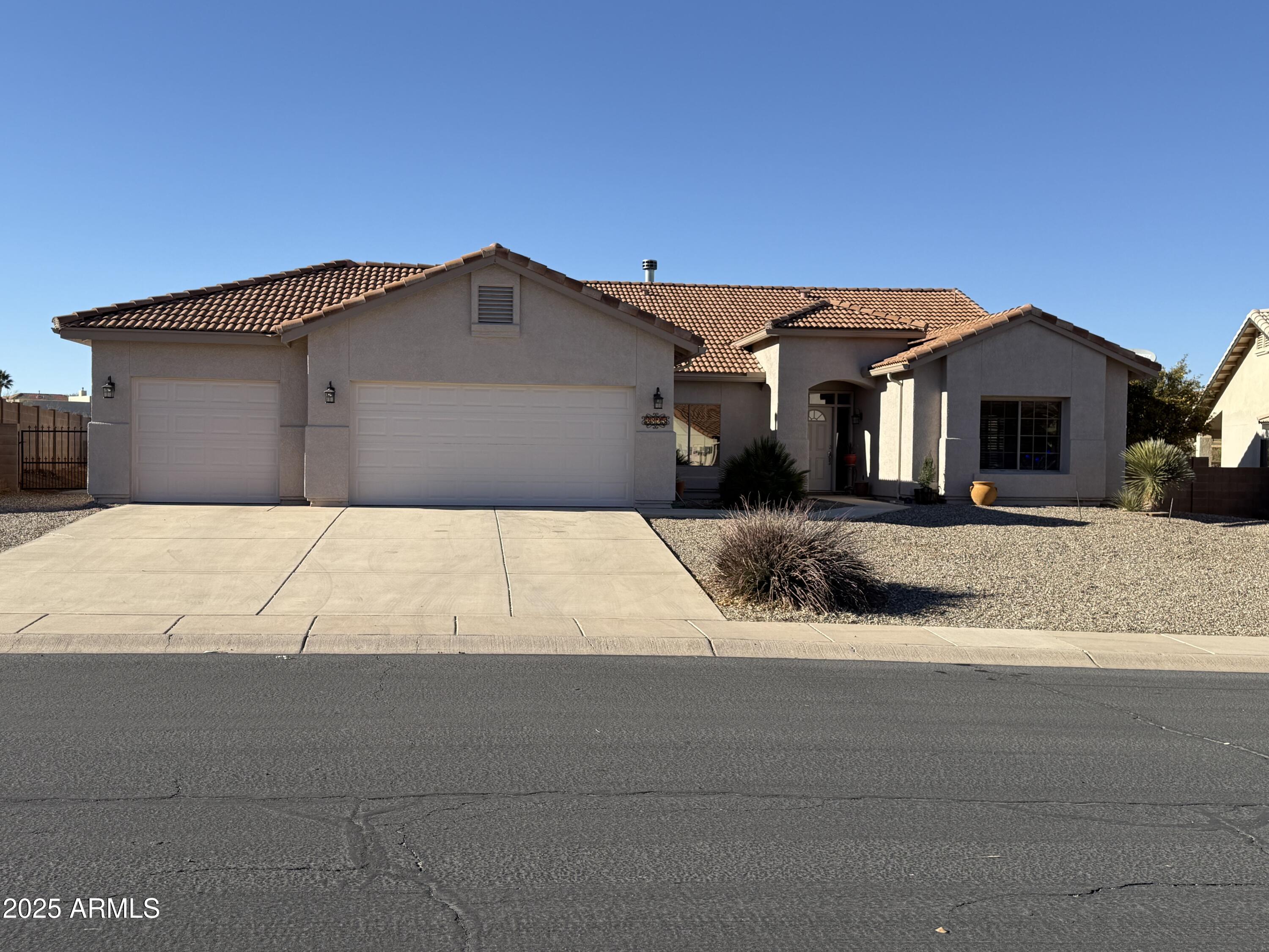 You will love this darling home that is ready for new owners. This unique home has 2 master suites! The smaller one has a large closet with built ins in the closet. The bath has a snail shower, large vanity and skylight. The other master suite is similar but also has a large garden tub as well as the snail shower and dual sinks and a skylight. Step out of the master bedroom to the covered patio in the back yard and enjoy the views. There is a formal living room and dining area as well as a breakfast bar and breakfast nook off the the family room with real fireplace. The updated kitchen has beautiful granite counters too. There is a large 3 car garage as well as a detached 1 car garage and RV parking. Do not miss this home.