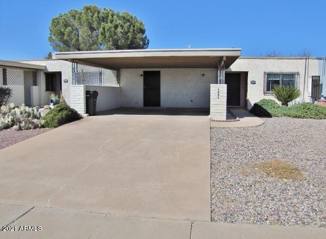 This spacious 2BR/2BA/2CP, 1,562sf townhouse is centrally located in Sierra Vista, AZ minutes from Ft. Huachuca, shopping, schools and Canyon Vista Medical Center . Nicely updated kitchen with newer cabinets and appliances and plenty of counter space and storage. Tile in all the kitchen and bathrooms, gorgeous wood laminate flooring in the living areas and a  warm and cozy
fireplace to create the PERFECT ambiance. Brand new A/C unit and new paint throughout and NO HOA. Call today.
