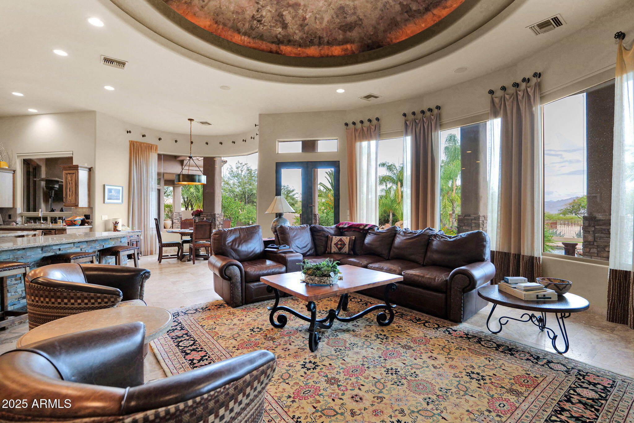 ULTIMATE 10-ACRE EQUESTRIAN ESTATE. A turnkey North Scottsdale facility for the serious horseman. Custom built 5,490 SF residence + 983 SF guest house. Professional grounds: breezeway barn w/ oversized foaling stalls, 13 shaded paddocks, 220x150 lighted arena w/ irrigation, 45' round pen, & 6-horse Priefert walker. Includes 2-bay hay barn & separate equipment bldg. Main home features a chef's kitchen, temp-controlled wine room, and private theater. Impeccably planned for efficient horse flow and high-end living. Gated, private, and meticulously maintained. A rare find. dedicated pool room, and resort-style heated pool and spa -- all positioned to capture breathtaking mountain views. 
With a private high-producing well and 10 acres that are
splittable, this property offers exceptional flexibility for a private estate, training operation, or investment opportunity. 
Direct access to Scottsdale's premier equestrian lifestyle -- properties of this scale, quality, and versatility are rarely available.