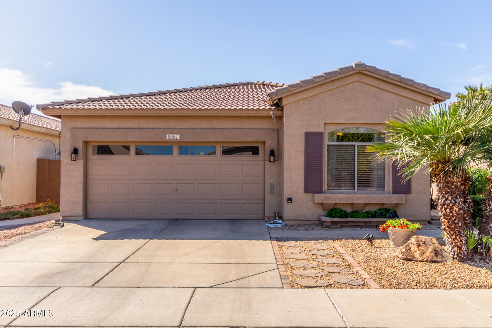 Beautifully maintained 3-bedroom, 2-bathroom home nestled in a gated community with resort-style amenities! This move-in ready home features an inviting eat-in kitchen with stainless steel appliances, granite countertops, a new dishwasher, and a new water heater. Step outside to a fully landscaped backyard with stunning views, a cozy fire pit, and a built-in barbecue perfect for entertaining or enjoying Arizona evenings. Residents enjoy access to a sparkling community pool, relaxing jacuzzi, greenbelts, and playgrounds. Ideally located near freeways, schools, hospitals, shopping, and dining. A perfect blend of comfort, convenience, and lifestyle - this home is a must-see!