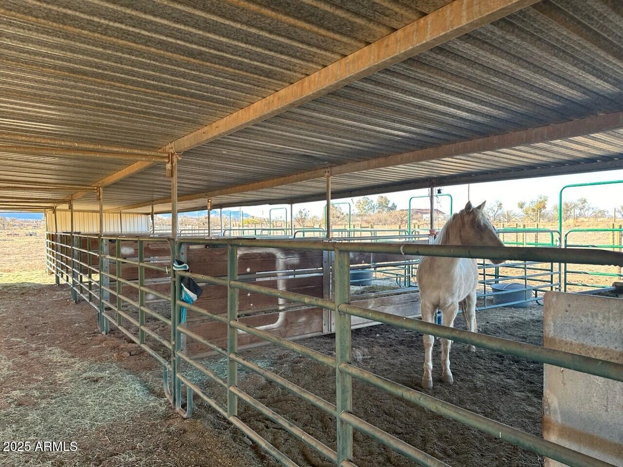 Are you looking for a horse ready property? Look no more? This wonderful property boasts a 36x72 10 stall barn. There is an office or ?? There is also a shed and a 1 car garage. The property is fenced and there is a turn out as well as 8 pens as well. A 1/3 well share and there is power site. This is a very special property. This has current permits and approval for a boarding facility. It is being used as such but never opened commercially. This is allowed in RU4 zoning. While at the property, please do not pet or play with any of the horses. Cross listed with mls# 6837106.