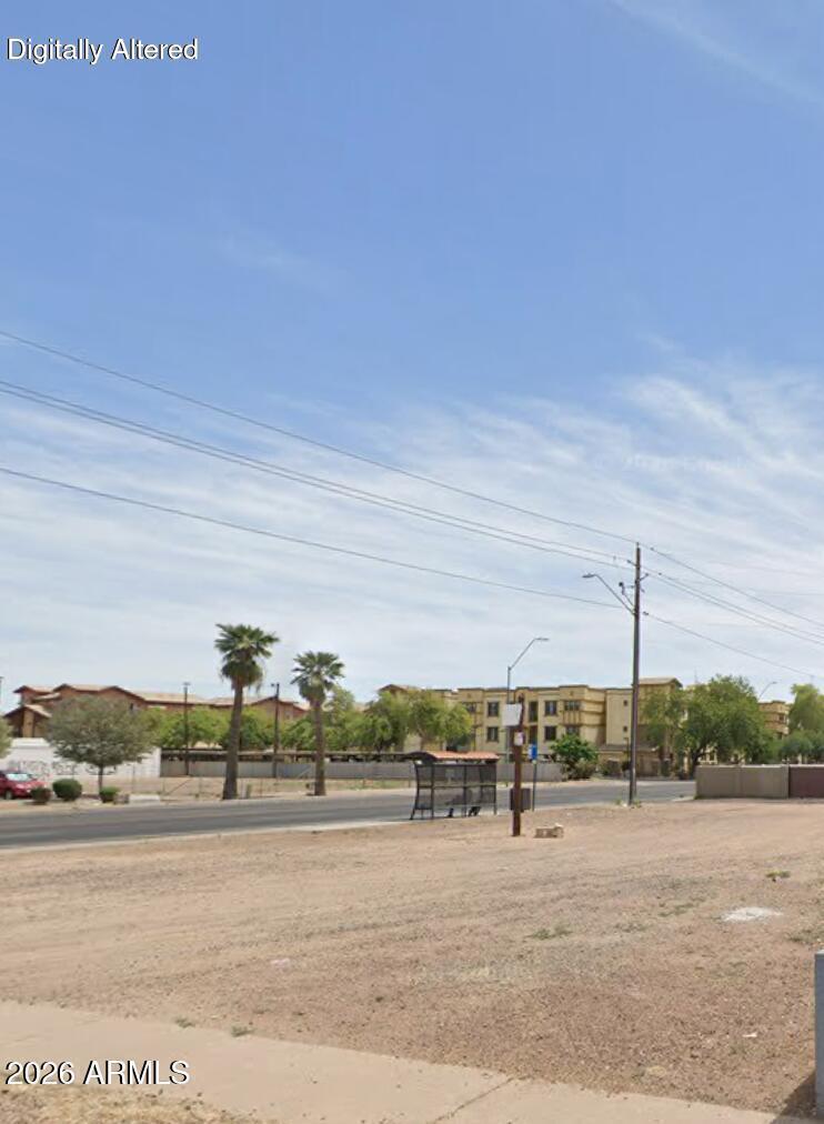 LOCATION, LOCATION, LOCATION! Exceptional C-2 commercial lot near Downtown Phoenix with endless development potential. Situated in the highly desirable Garfield area surrounded by new growth, businesses, restaurants, and residential redevelopment. Ideal for retail, office, mixed-use, or investment opportunity. Easy freeway access and minutes from Downtown Phoenix, Roosevelt Row, and the Biomedical Campus. Don't miss this rare opportunity to secure land in a rapidly appreciating central Phoenix market. Buyer to verify zoning, utilities, and all material facts.