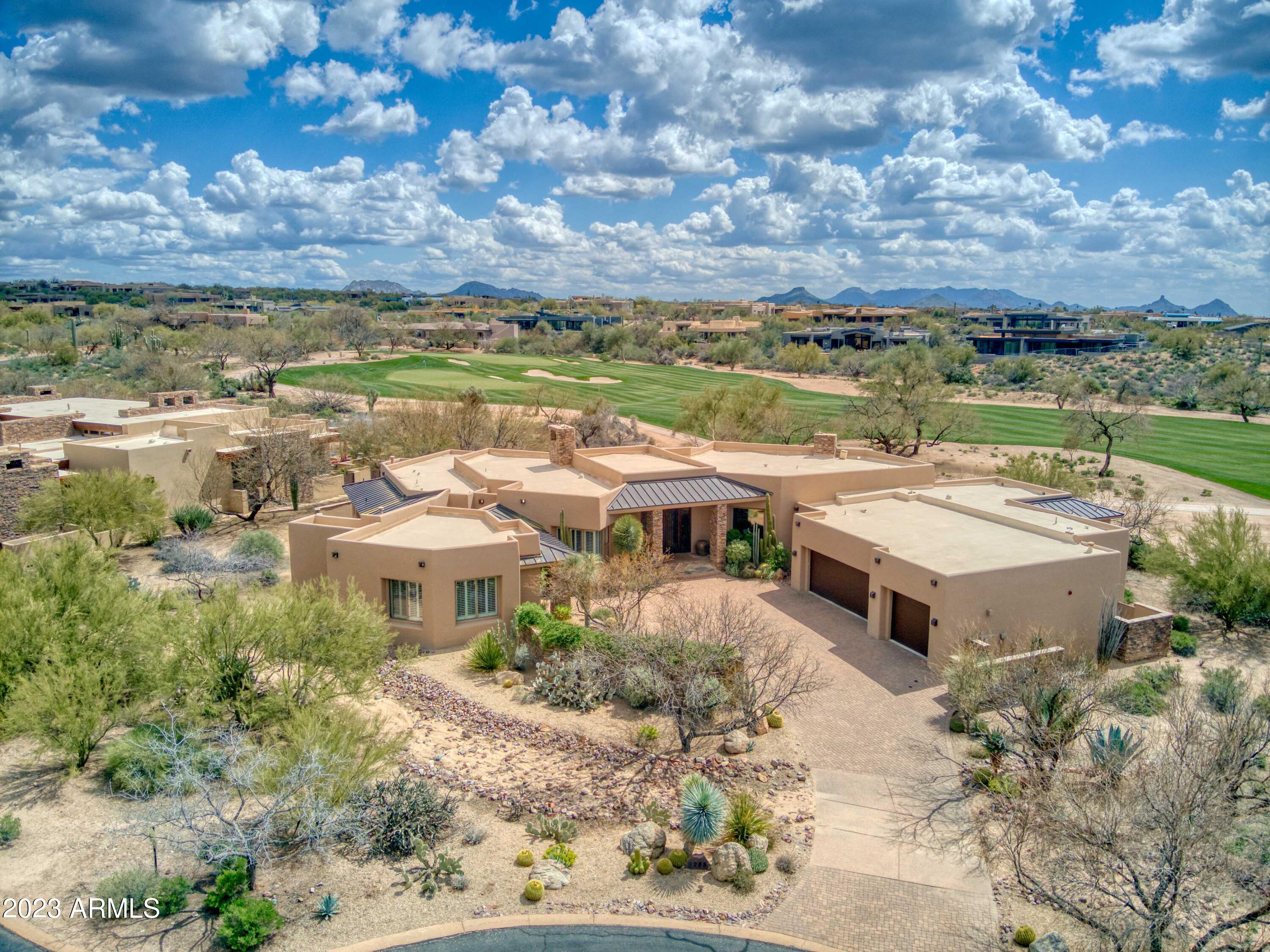 Fully furnished with Golf Membership available from seller!!  This Desert Contemporary Design is located on the 15th Fairway of the newly renovated Renegade Golf Course.  5 Bedroom 5.5 Bath in Main House and Detached Guest Housel Southern Exposure with Lots of Mitered Glass and passive solar, 16' Telescoping window walls (3 sets) open to Large Covered Patios. Negative Edge Pool and Spa, BBQ and Fire-pit. Top of the Line Kitchen Appliances, quartz countertops, Travertine Floors, Wet Bar,, Walk-in Wine Cellar. This is a Fabulous Custom Home on the Golf Course with a membership located in the Village of Gambel Quail Preserve Don't miss out!!!
30 day approval process to transfer sellers Golf Membership. Please contact the DM membership office for more details