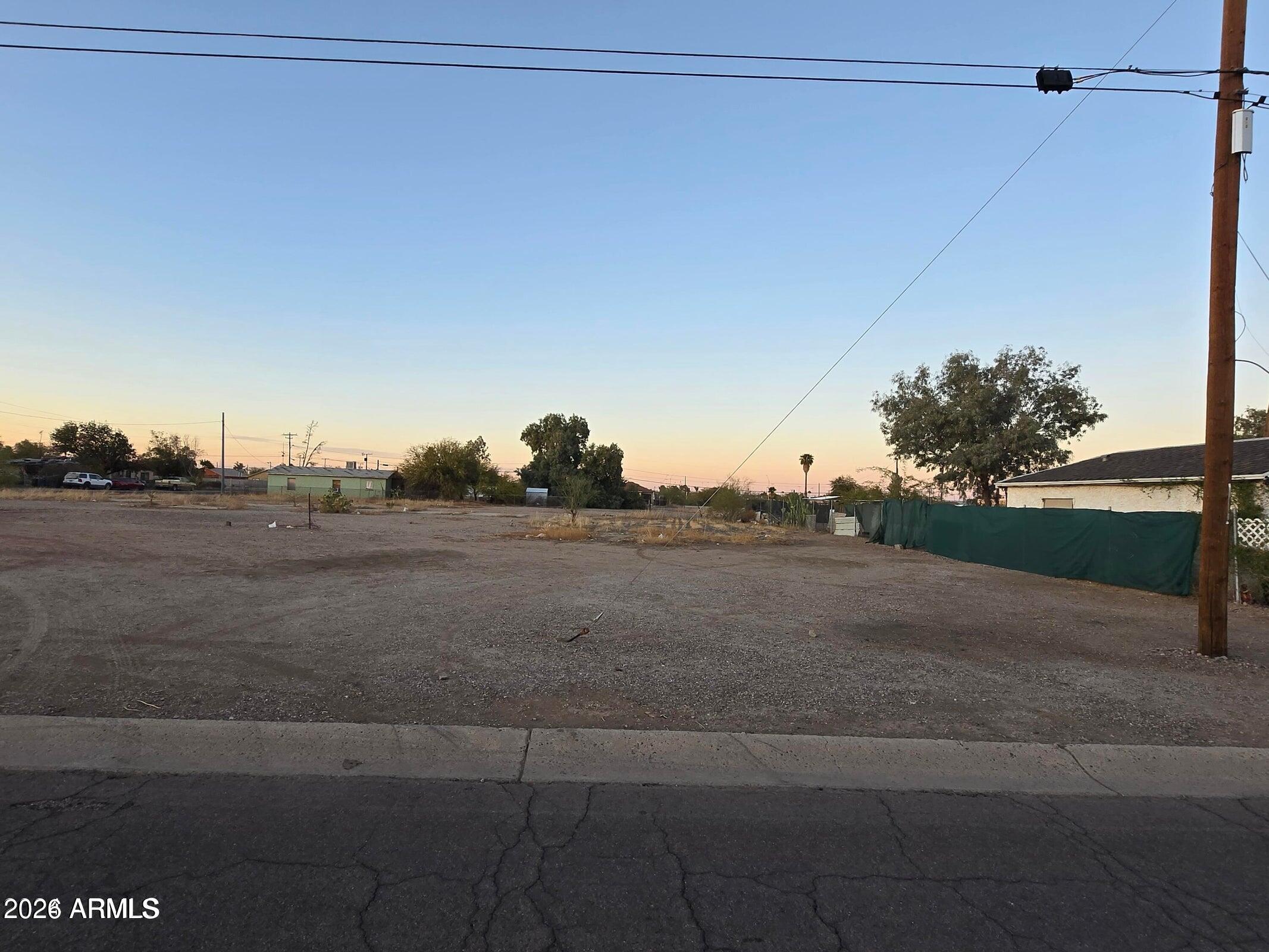 Looking for a Deal on a Lot with a Nice Location right in the Eloy city center? This is it! Located less than 2 Miles from the I-10 in the midst of all Eloy has to offer - This lot is 50 × 150 at 7501 sq feet. Many options to consider. Professional office, Research and Development, Wholesale or Storage Warehouse, Utility Center, Packaging or Processing of Goods, External Storage Yard, etc. City of Eloy Guidelines and Approval Required.