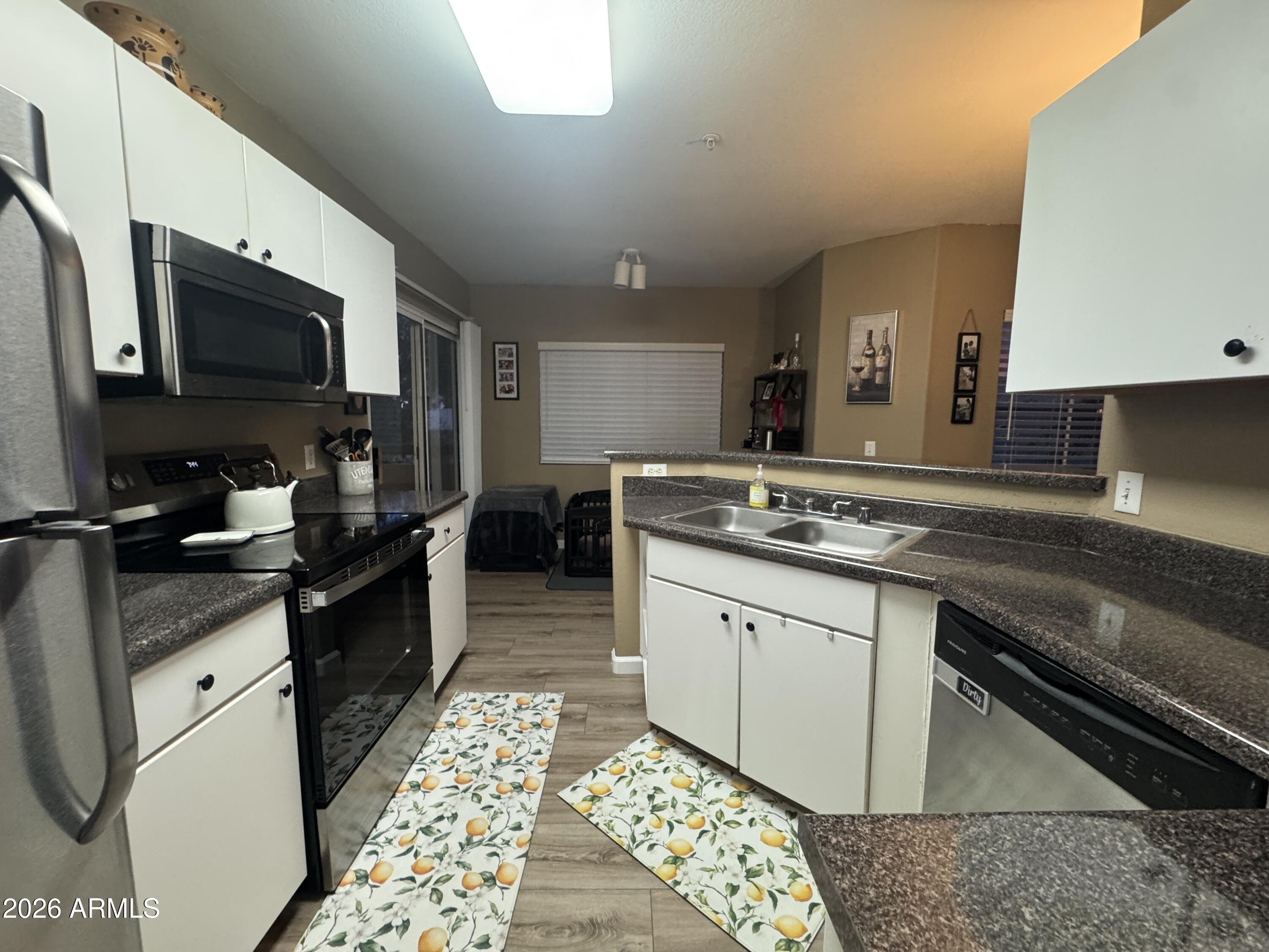 Nice newly renovated upper unit only 1 mile from downtown Gilbert.  This charming unit sits on a private side overlooking the greenbelt with no buildings off the private balcony. Fireplace. 2 bedrooms. 2 bathrooms. Master walk in closet and walk in glass shower. Master also has private sliding door to balcony. The kiltchen has stainless appliances and tons of cabinets.