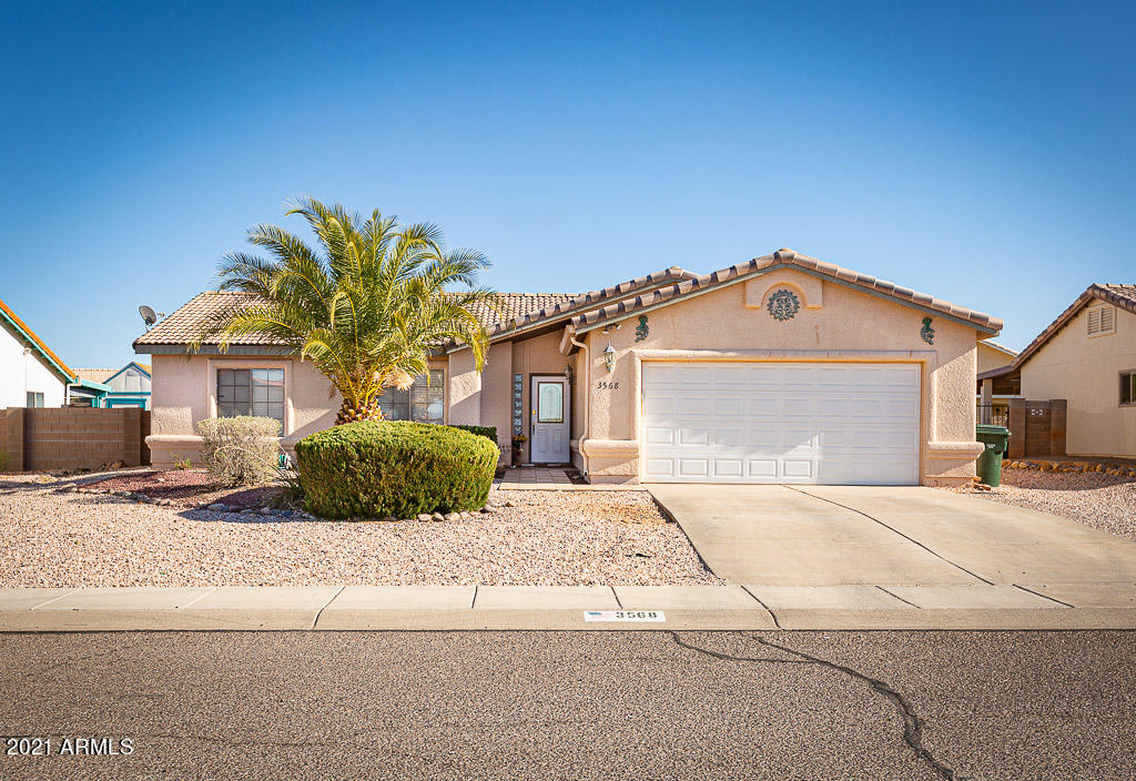 Truly a gem with open floor plan, high ceilings, granite counter tops, beautifully detailed tile floors, fireplace, & large backyard with a pergola and block wall! Yard is nicely landscaped and low-maintenance.  Located close to shopping in the highly desirable Canyon De Flores subdivision.  Don't miss the chance to call this great house your home!
