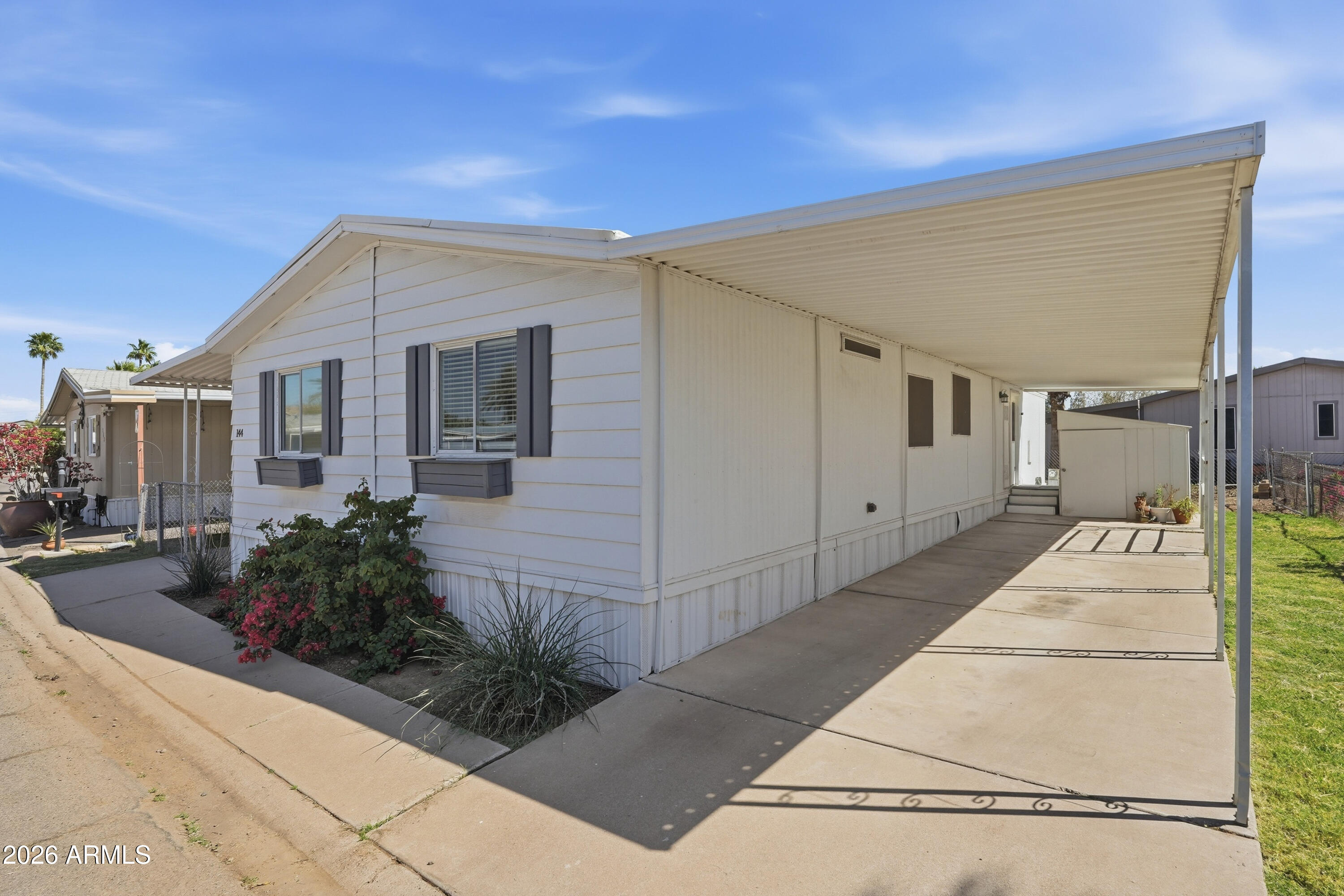 Recently remodeled within the last 3 years, this beautifully updated double-wide manufactured home offers comfort, style, and affordability in a welcoming all-age family community. The spacious layout features a modern kitchen with sleek stainless-steel appliances, updated finishes, and attractive new flooring throughout. Thoughtful upgrades provide both style and peace of mind, including professional re-leveling of the home and installation of a French drain system to help maintain long-term stability. With its blend of modern updates, generous space, and family-friendly community setting, this home is a fantastic opportunity for buyers seeking move-in-ready value.  A Transferable Home Warranty through Liberty Home Guard is in effect until 9/23/2028