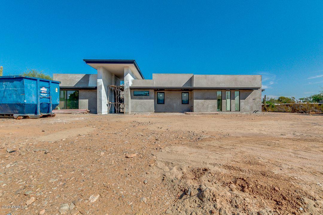 *Completion Dec 2020* Breathtaking new 2020 Modern build 5,995 sqft home  sitting on a prime 1+ acre lot in Paradise Valley. Within minutes to dining and shopping. Features of this stunning home includes 5 bedrooms and 5.5 bathrooms, dining room, great room, media/game room, butler pantry, master bedroom with his & her vanities, walk in closest and built in master office. Guest living quarters with living room, walk in closest and dual sinks. The gourmet kitchen has sub zero & Wolf appliances, 2 kitchen island & hidden pantry. This luxurious home includes the finest finishes and custom built cabinets. Spectacular backyard with views of Camelback Mountain will include outdoor BBQ area with, gas fire pit and a pool. This home is perfect for entertaining and enjoying the luxury lifestyl